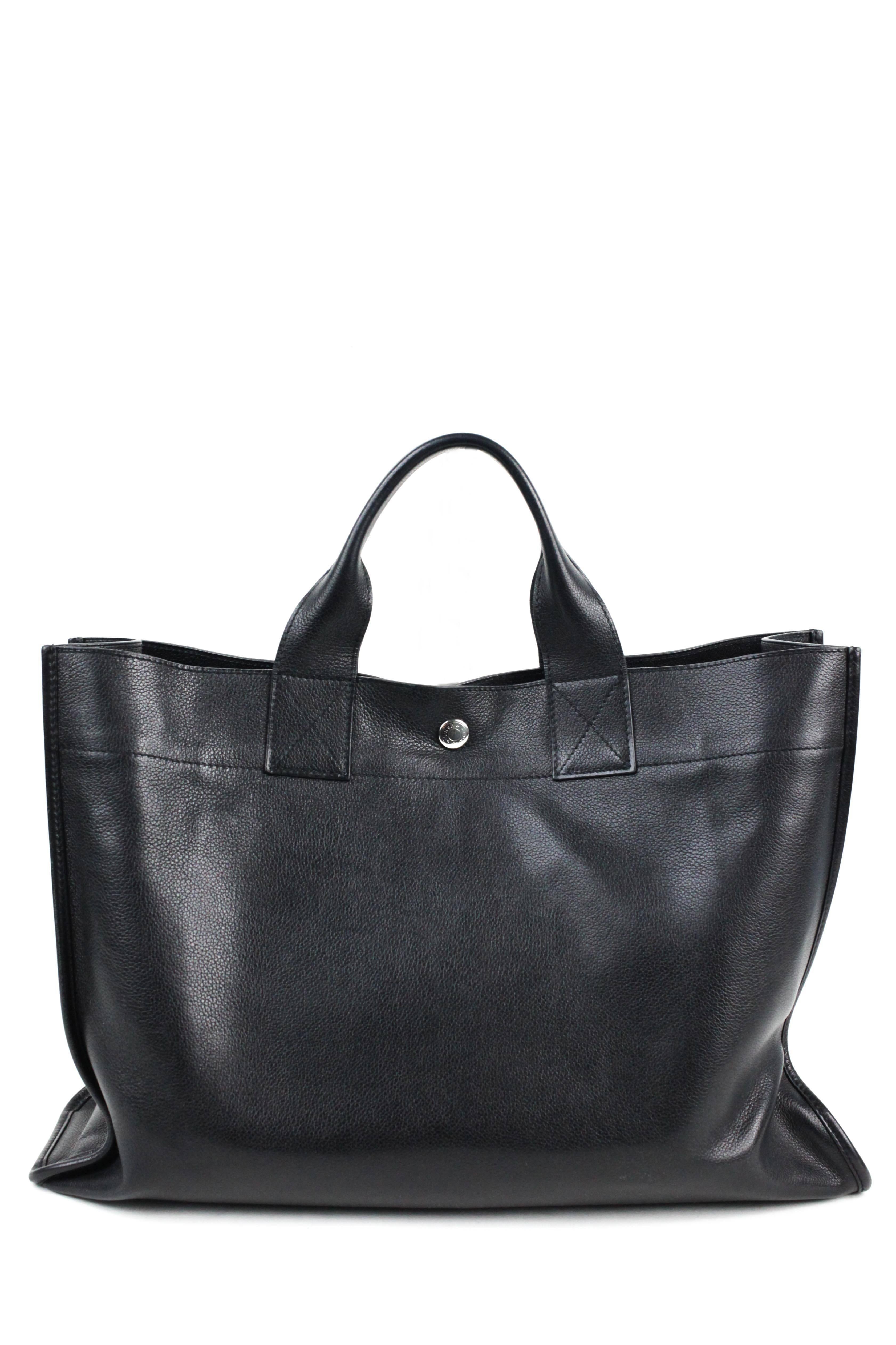 Offered is a unique style by Hermes, a GM size Clemence leather tote with a long zipper pocket in front.  Silver tone hardware against the soft pebbled grain offers a versatile piece for your collection.  

DIMENSIONS:

Height:  10.5
Width:   
