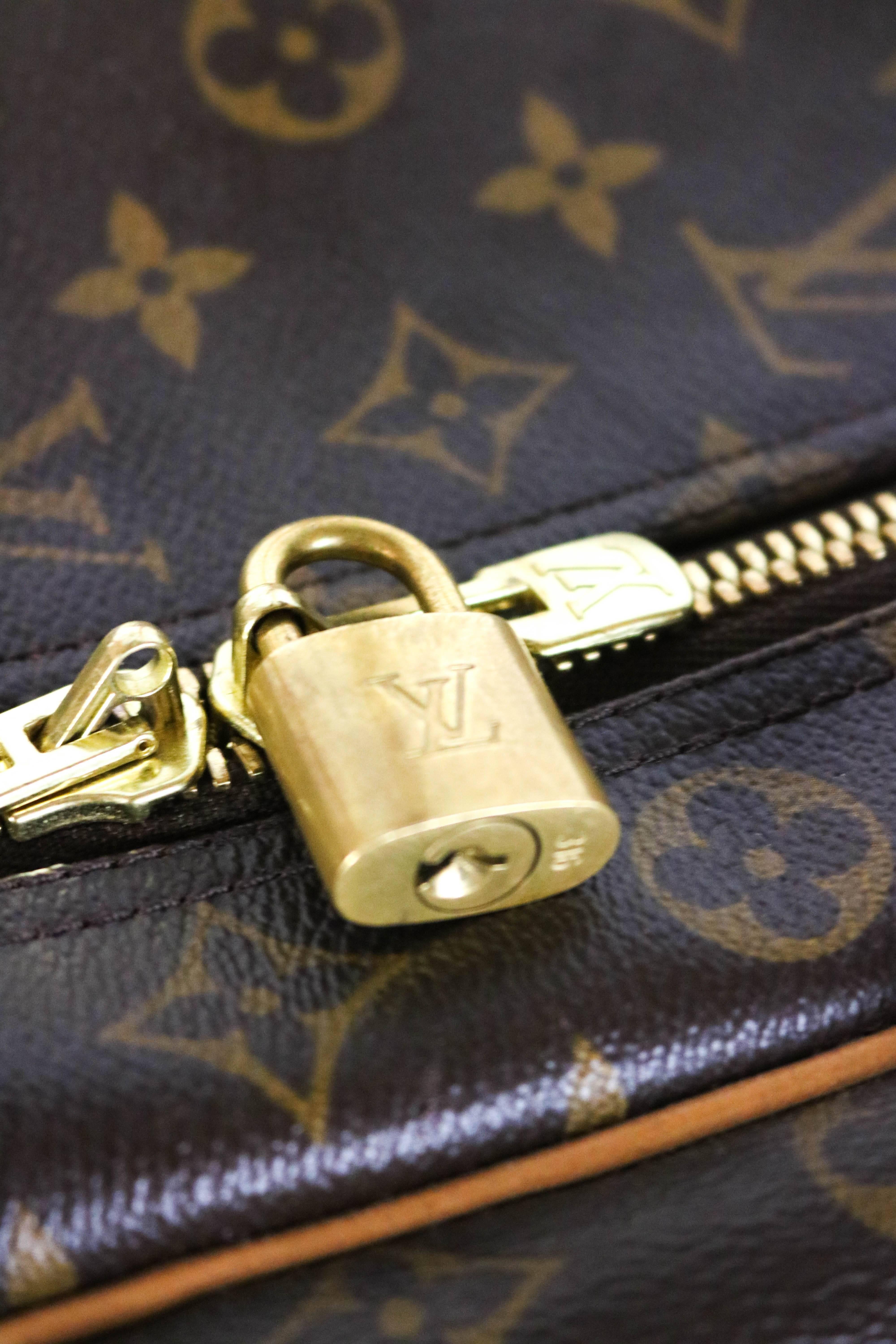 Offered is an Authentic Monogram Canvas Louis Vuitton soft sided suitcase from the travel collection. This piece measures 55 centimeters, reflecting the name 