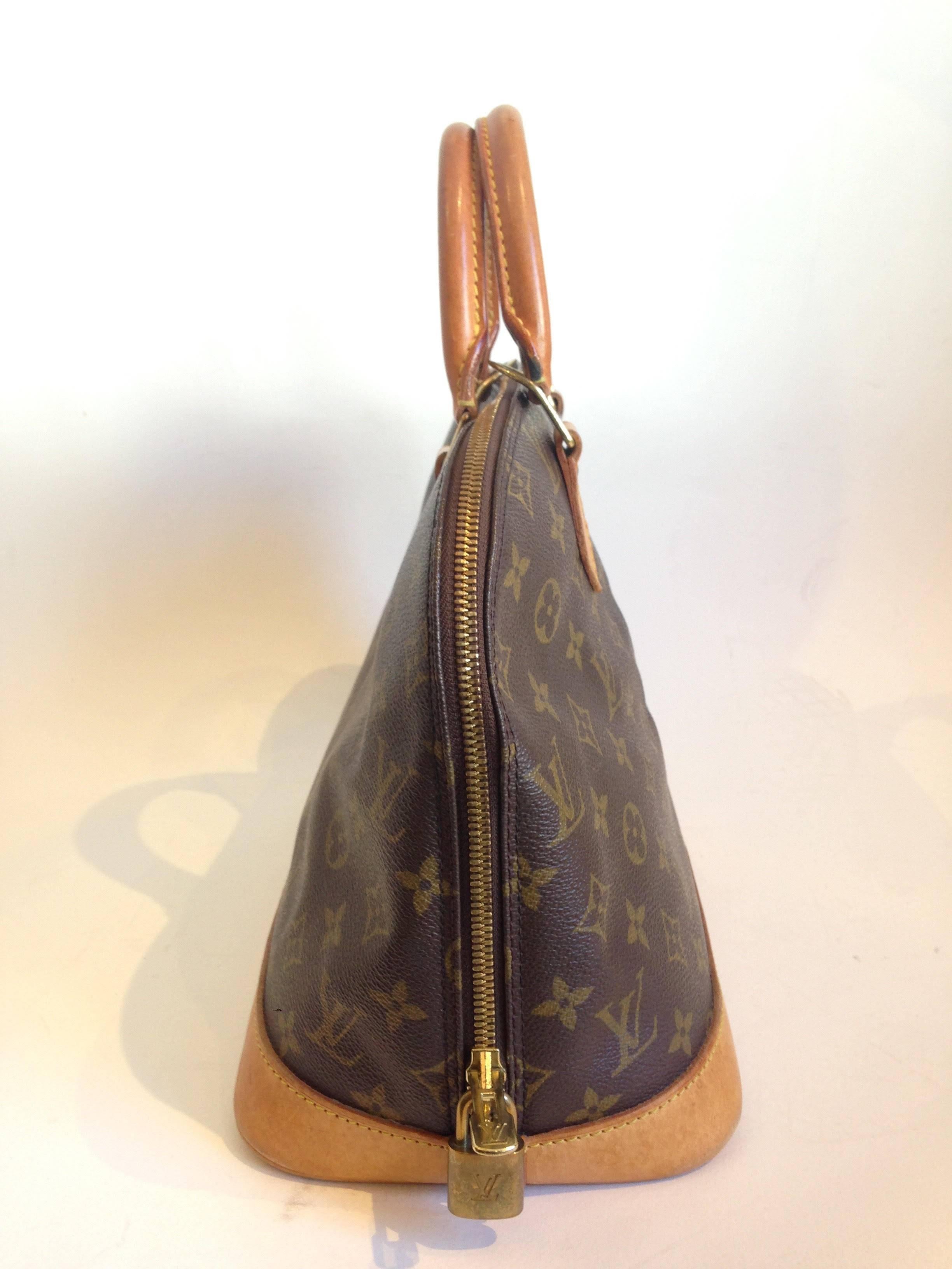 Louis Vuitton Monogram Alma Handbag with good condition. 