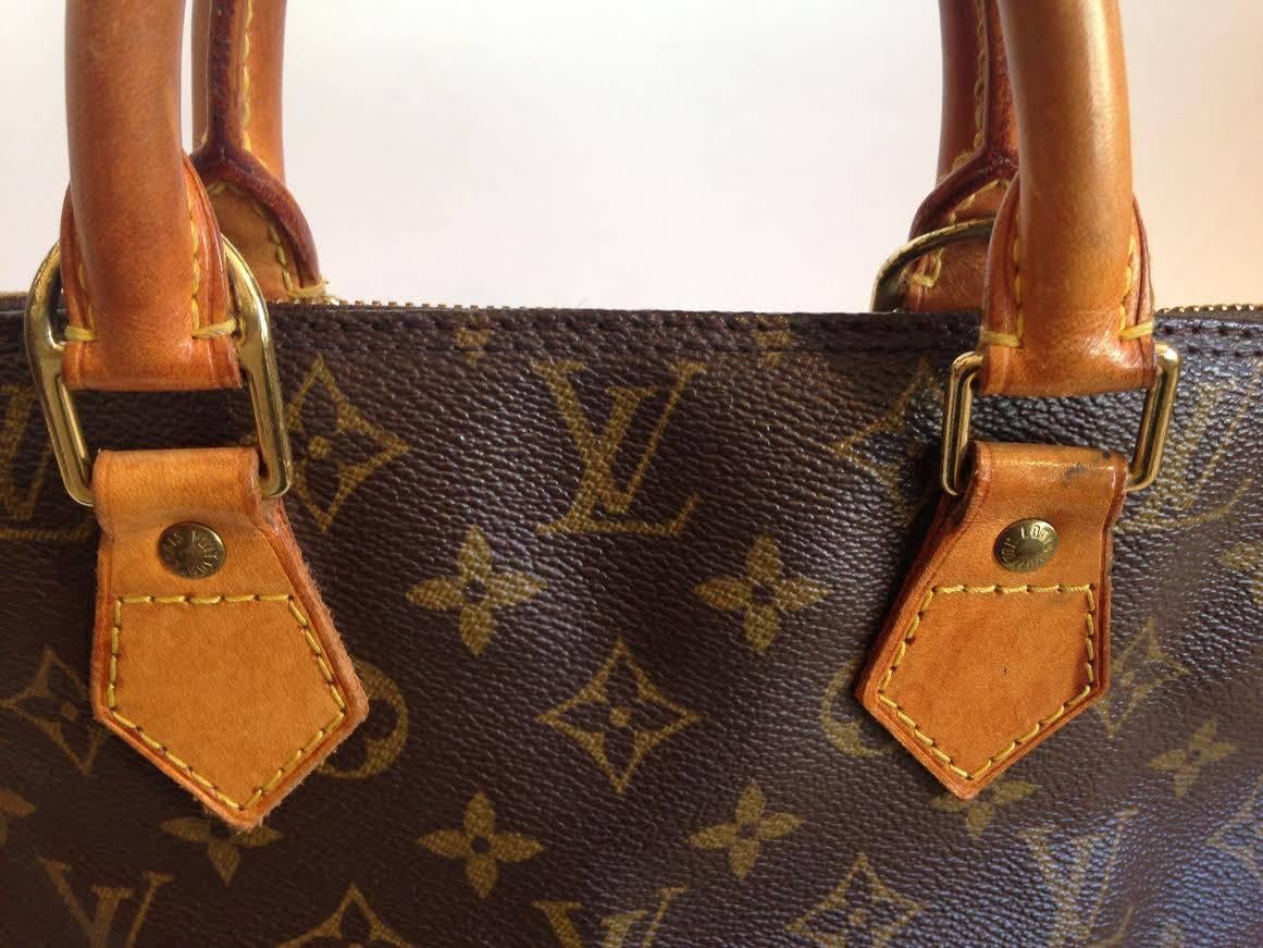 Louis Vuitton Monogram Alma Handbag 4