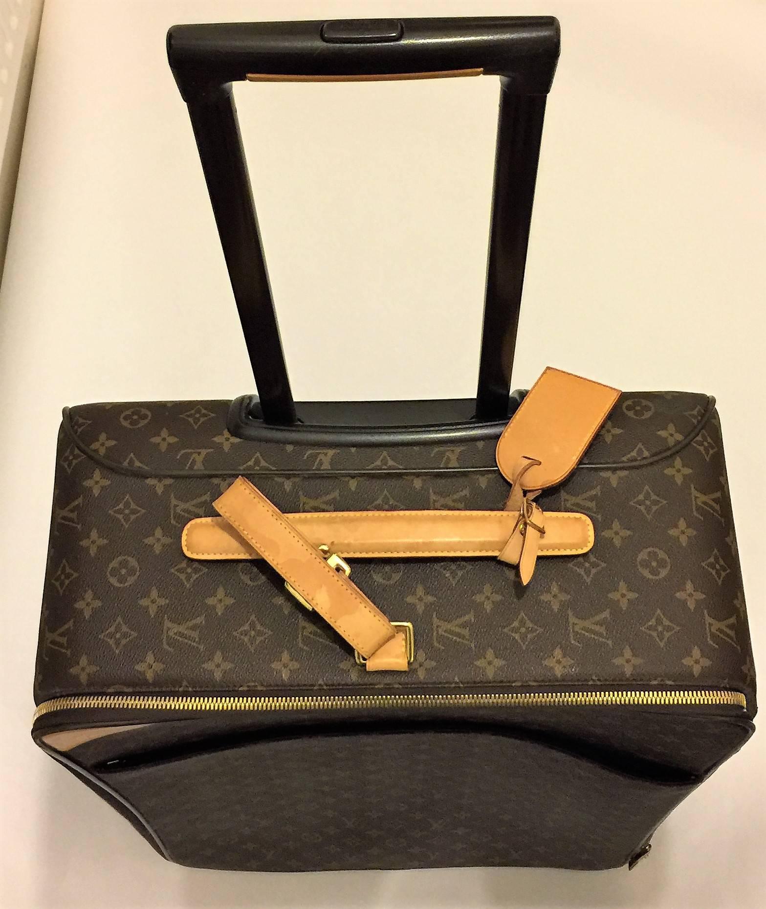 LOUIS VUITTON PEGASE 65 MONOGRAM ROLLING SUITCASE.
Crafted by Louis Vuitton in classic Monogram canvas, Pegase 65 is the largest of the cabin size rolling suitcases. It features particularly stable and noiseless wheels.  Measurements 47cm by 67cm
