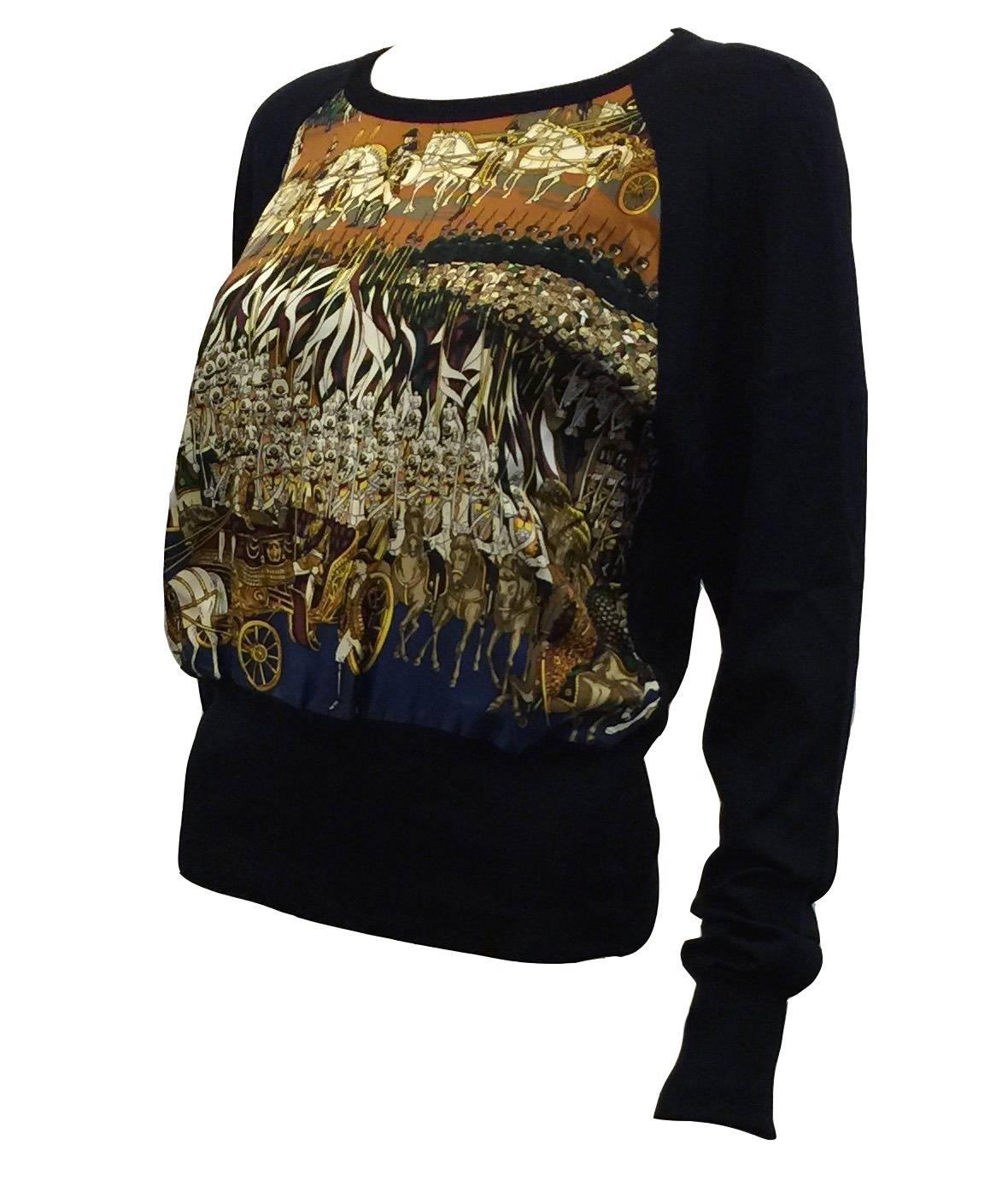 Hermes Paris Sweater with Silk Front.  
Grand Cortege A Moscou
Designed by Michel Duchene
It depicts a pageant of Military Units.
Navy Base with Gold 100% Silk Top
Hermes Silk Front Print with Navy Silk Long Sleeves
Back Round Neck
