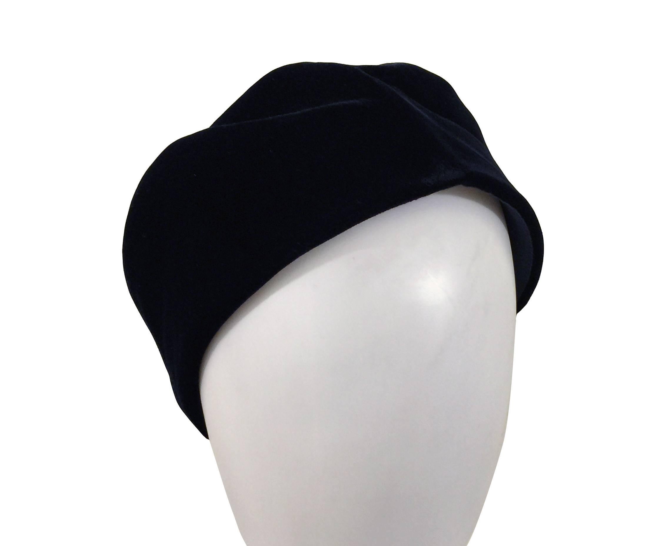 Giorgio Armani Ladies Vintage Beret.  Stylishly Chic Jet Black Velvet Beret.  Very Good Condition.  Size 57.  Material Silk Velvet; Color Black.  Made in Italy.  Grosgrain Band Interior.  Silk Lined.  Armani 1993.  RRP £680.