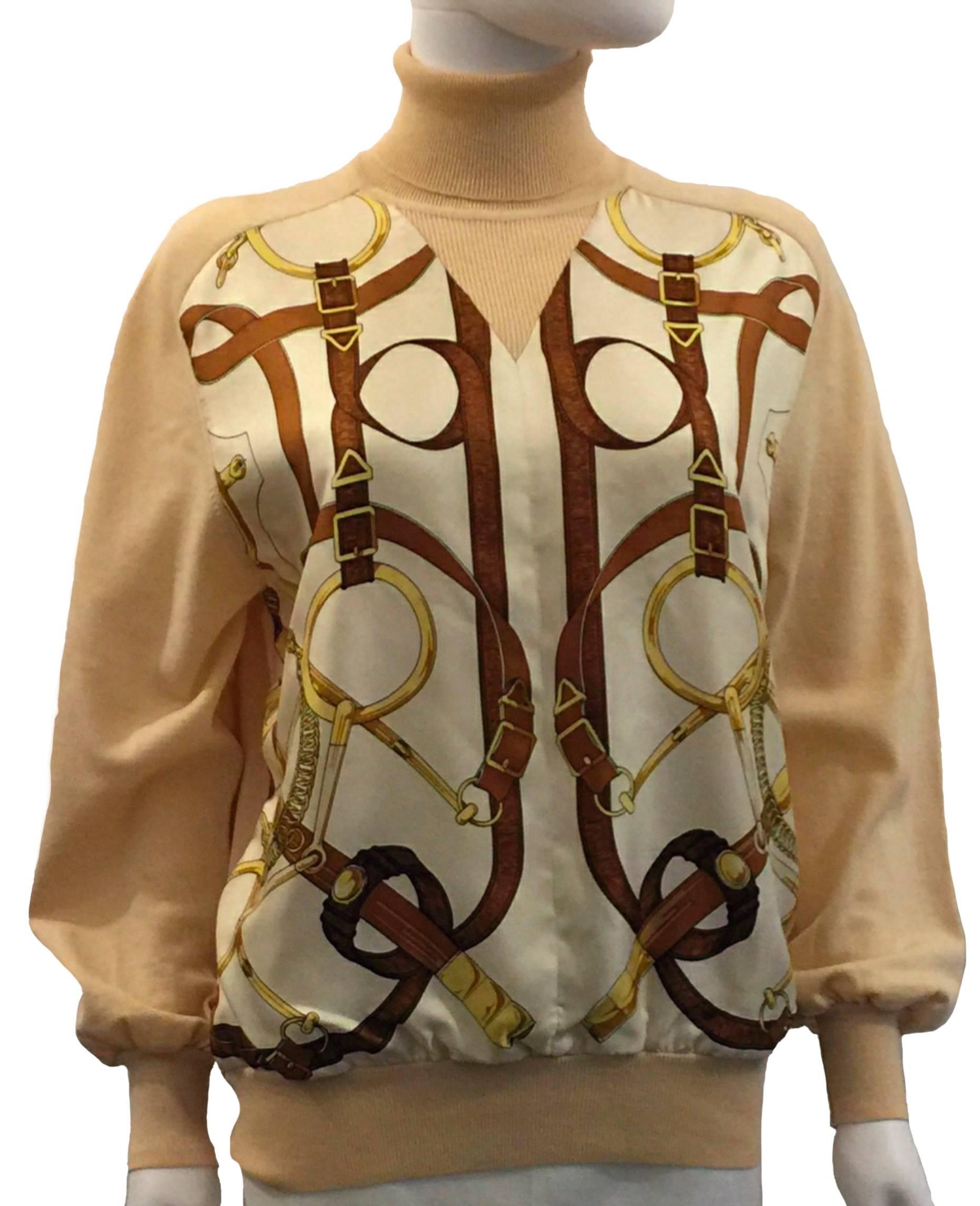 Hermes Twin Set with matching Scarf.  Vintage.  100% Silk with 100% Wool.  Colors- Cream Base with Brown & Gold.  Size EU42.  Sleeve 63 cm; Shoulders 42cm & Length 66cm.  The Set comprises a Polo Necked Equestrian Silk Fronted Sweater; a Matching