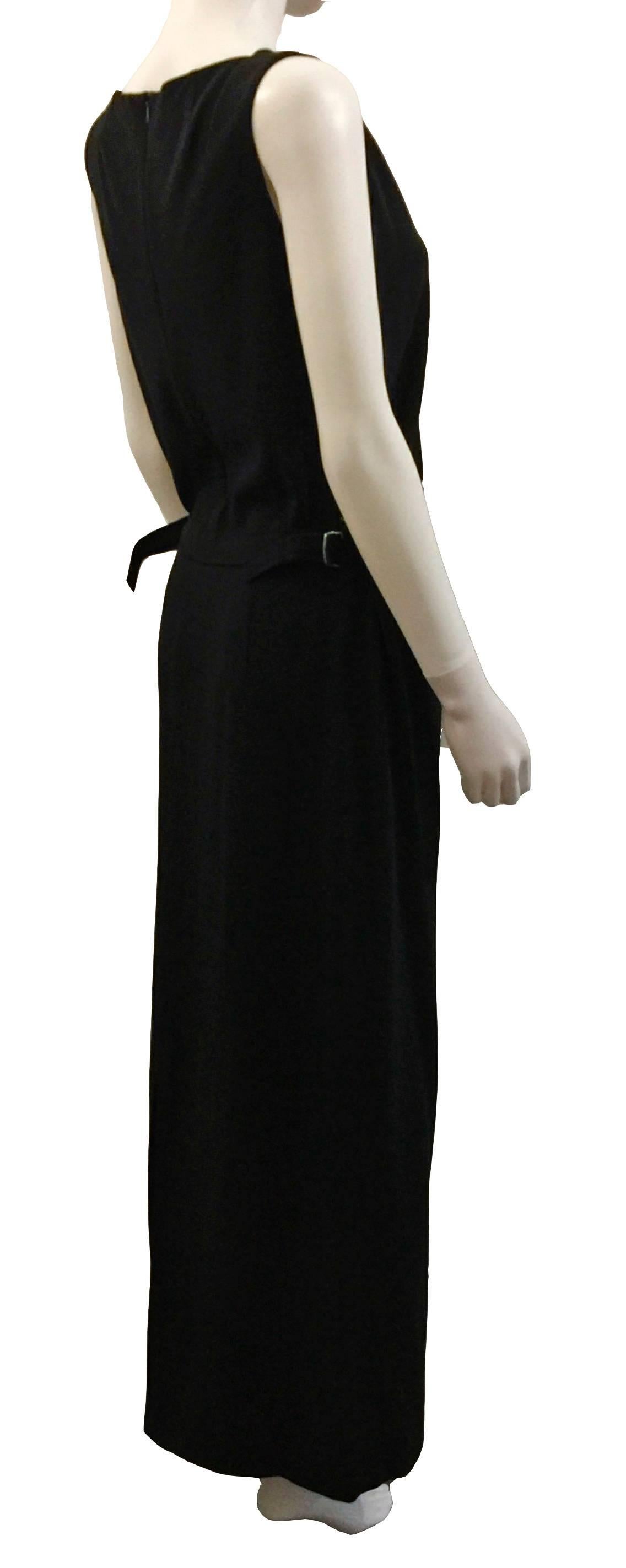 Jil Sander stylish long black dress.  Sleeveless with straight long skirt, vent on back of skirt, zipped with side adjust ties. Size EU38.  Material is a high quality 96% Fleece Wool with 4% Elastane.  Very Good Condition.  This item is guaranteed