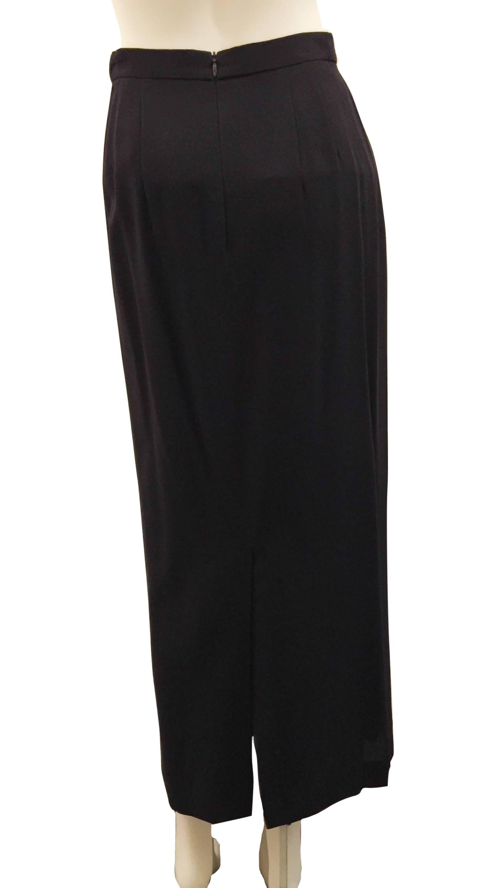 Jil Sander Navy Midi Skirt. Length 94cm/36.5in; Waist 70cm/27in; Vent 39cm/15in; Zip 22cm/8in.   Lining 100% Cupro. Size EU36.  Smart Slim Fitting Straight Midi Skirt.  Made in Italy.  Fabric is 65% Fleece Wool; 29% Viscose & 6% Nylon.  This smart