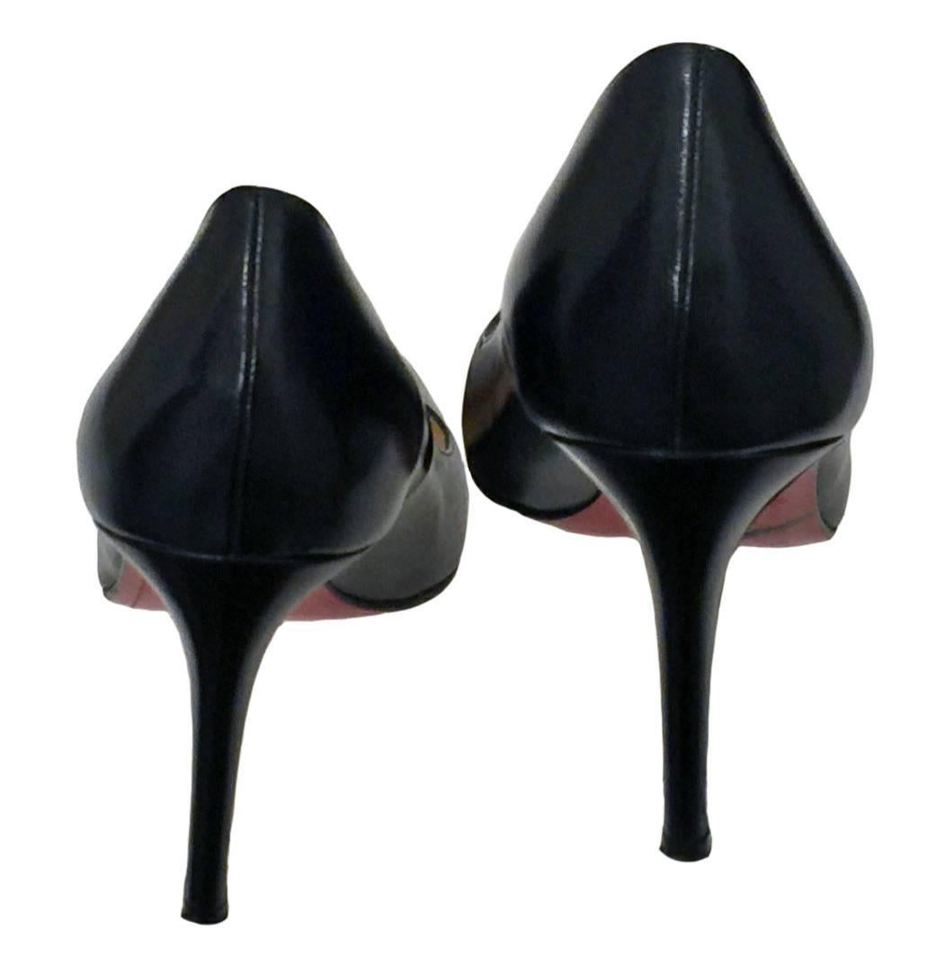 Christian Louboutin Simple Pump.  Navy Calf Leather.  Very Smart Classic Pump.  Pre-owned Good Condition some minor scratches on Leather.  Stiletto Heel Height 8cm. Size EU39.5.  Distinctive Louboutin Red Sole.  Made in Italy.  Comes with original