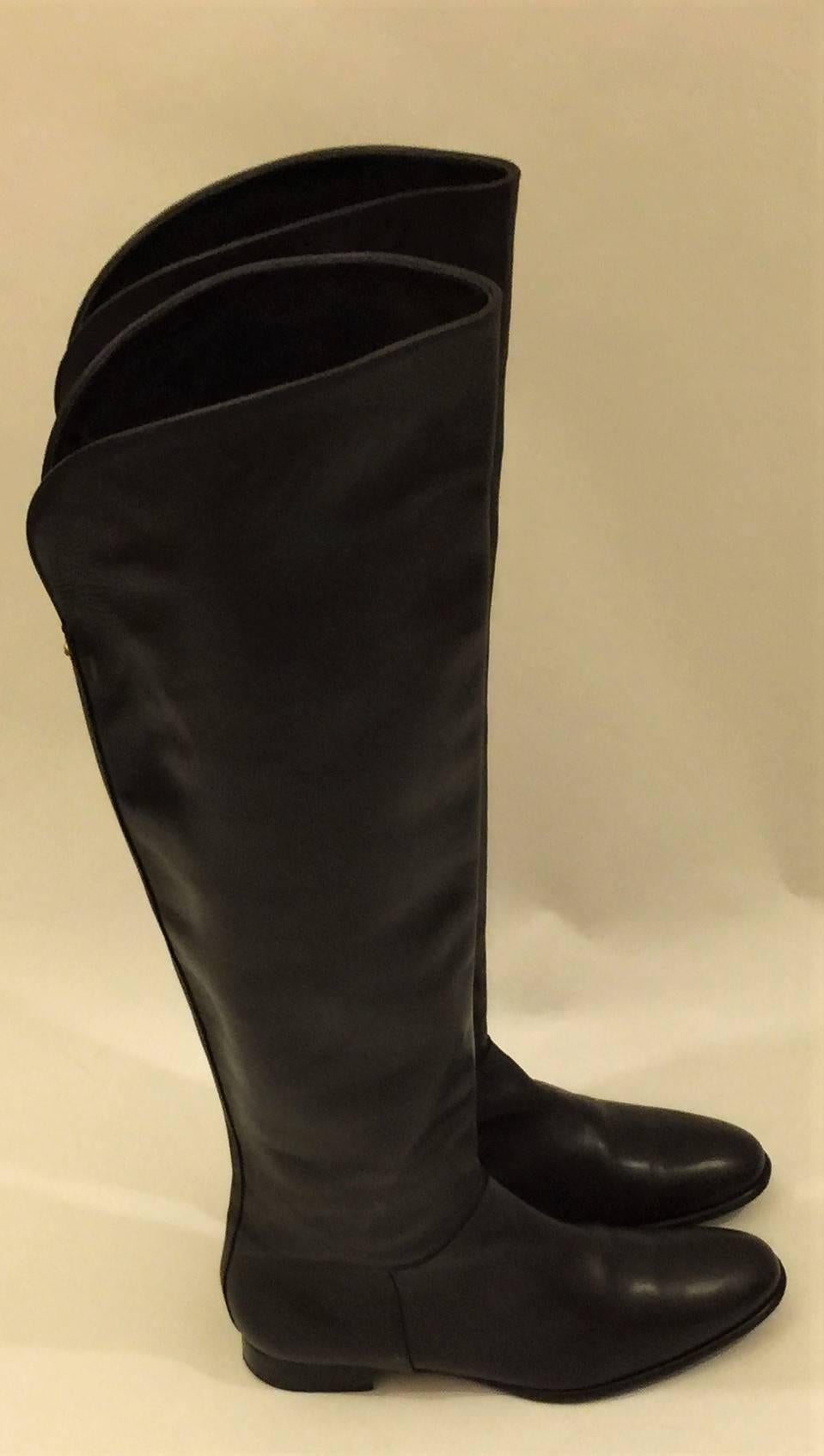 Loro Piana Iconic hand-made 100% Leather Knee High with turn-back Cuff Boots.  These Boots are of the highest level of quality and are ready to wear - a very versatile addition to any wardrobe.  Fashion’s sharp gaze is now focused on your feet, as