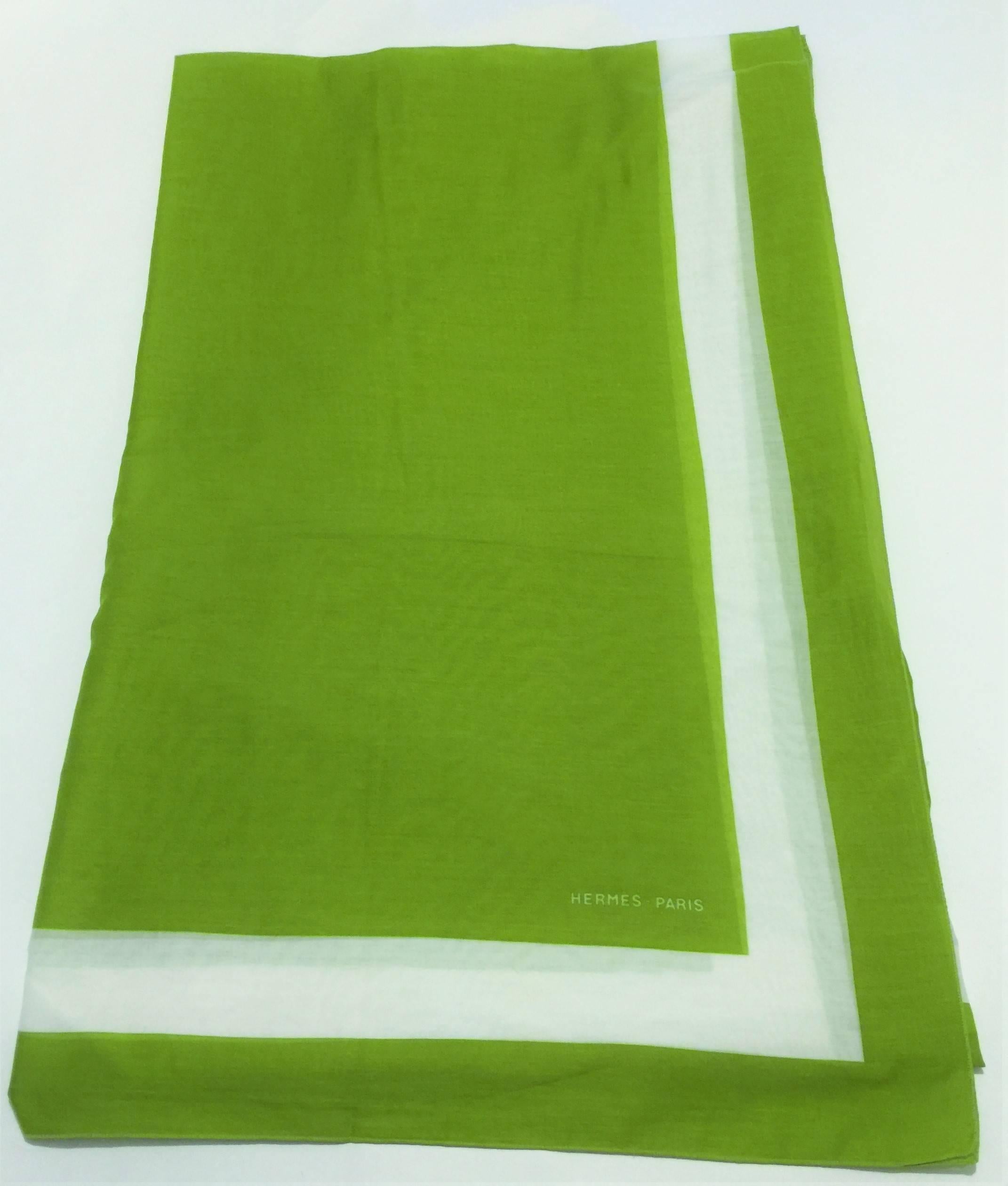 Hermes Plain Yachting Beach Cover-Up.  100% Cotton Muslin. Signature Hermes Beach Cover-Up in Lime Green with White Border.  Size 55 inches by 69 inches or 146cm by 176cm.  Made in France.  It is ideal for Pool/Beachside cover-up and a truly lovely