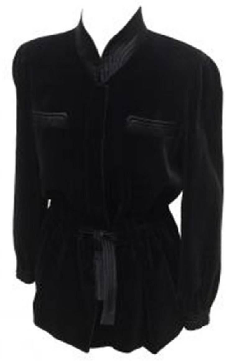 Valentino Boutique Vintage (1985) Black Velvet Ladies Jacket with Black Silk detailing.   Made in Italy.  Fly concealed buttoning; silk tie gathered belt; two concealed side pockets.  Good Vintage condition but because of its age (31 years) it has