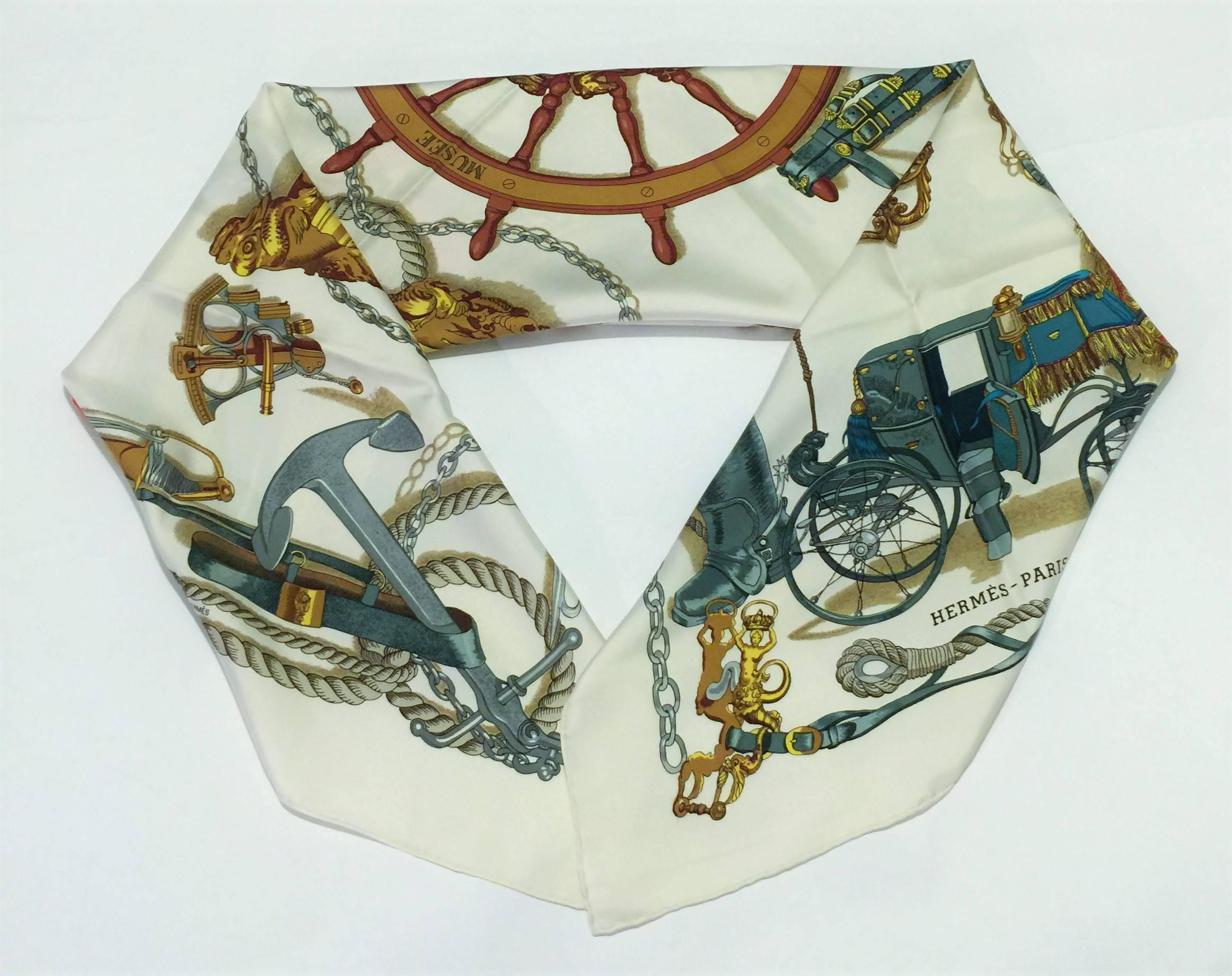 Hermes Paris Vintage Authentic Hermes ‘Musee’ a Classical Hermes 100% Silk Twill Scarf by Philippe Ledoux.  Designed in 1962 and re-issued in 1992 and 1997.  Dimensions are 90cm square.  Hand Rolled Hems.  Colors White, Red, Gold, Brown, Green;