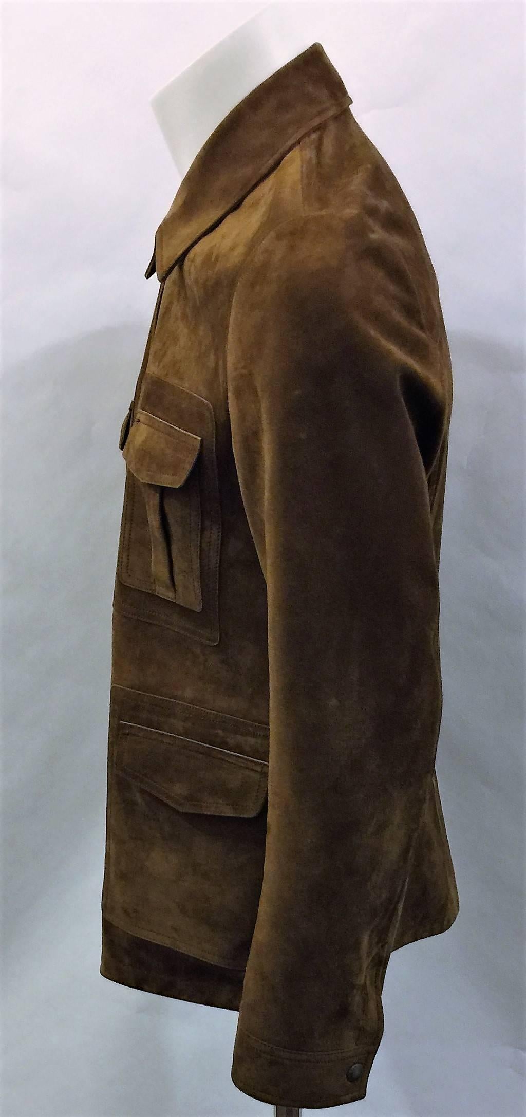 Tom Ford Men’s 100% Calfskin Brown Suede Field Jacket.  Crafted in Italy from Buttery Soft Suede, this Tom Ford Field Jacket is a luxurious take on a classic design.  It’s cut slim and fastens with a sleek zipper.  It works particularly well as part