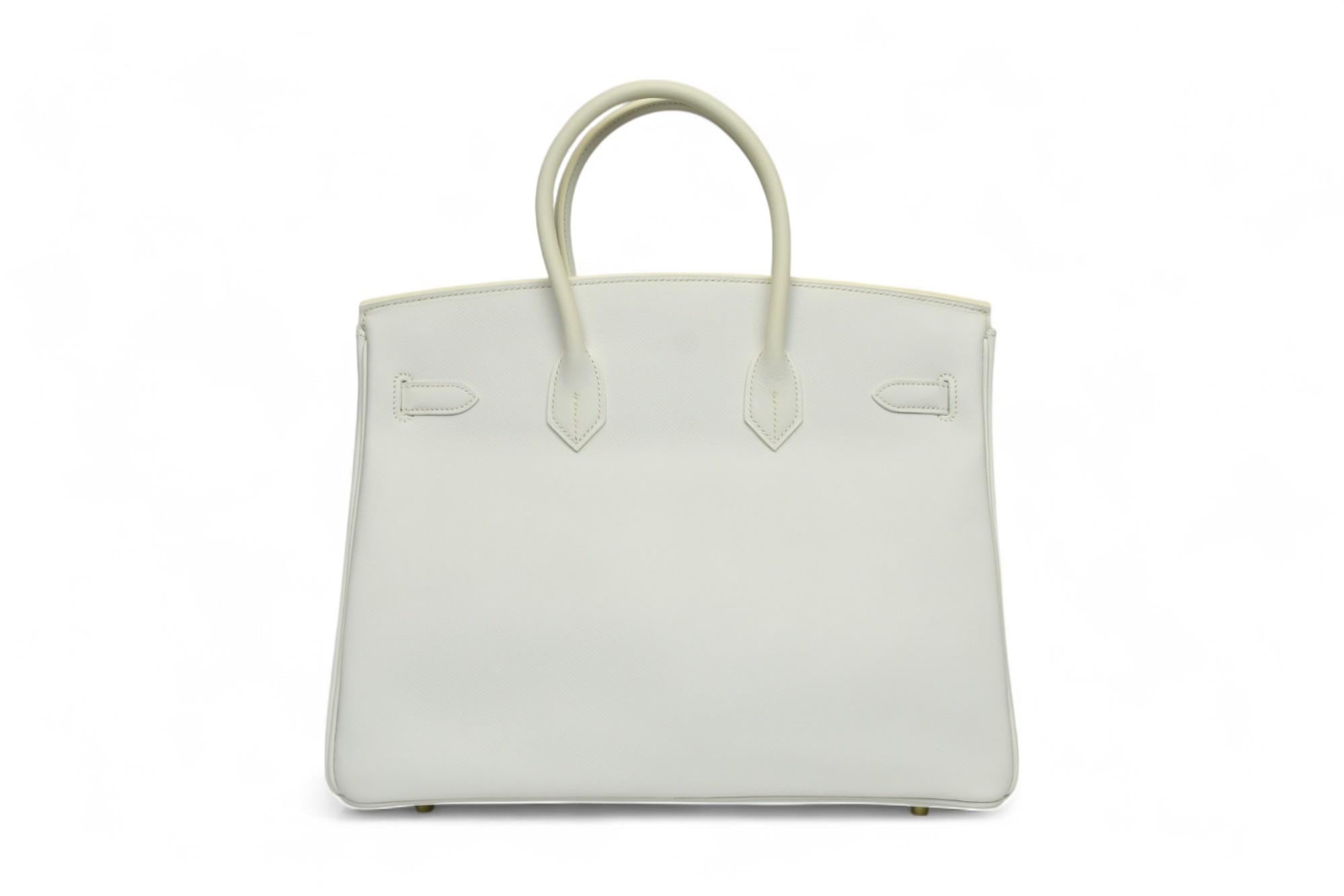 Donna Hermès Birkin 35 in pelle bianca di Togo con finiture in oro e chiusura a scatto in vendita