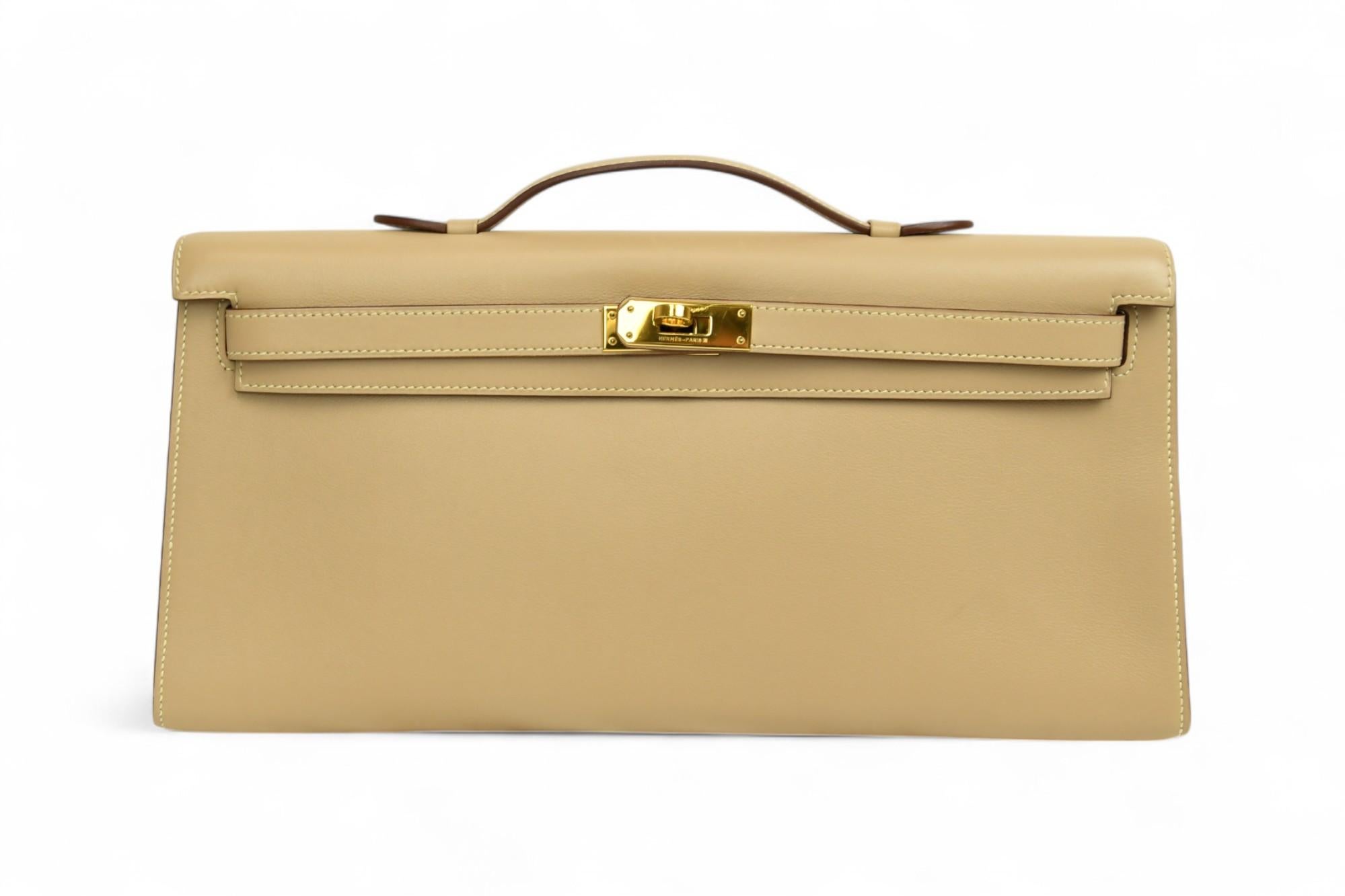 Donna Hermès Swift Kelly Longue Clutch Pochette Parchemin  HW dorato e serratura classica in vendita