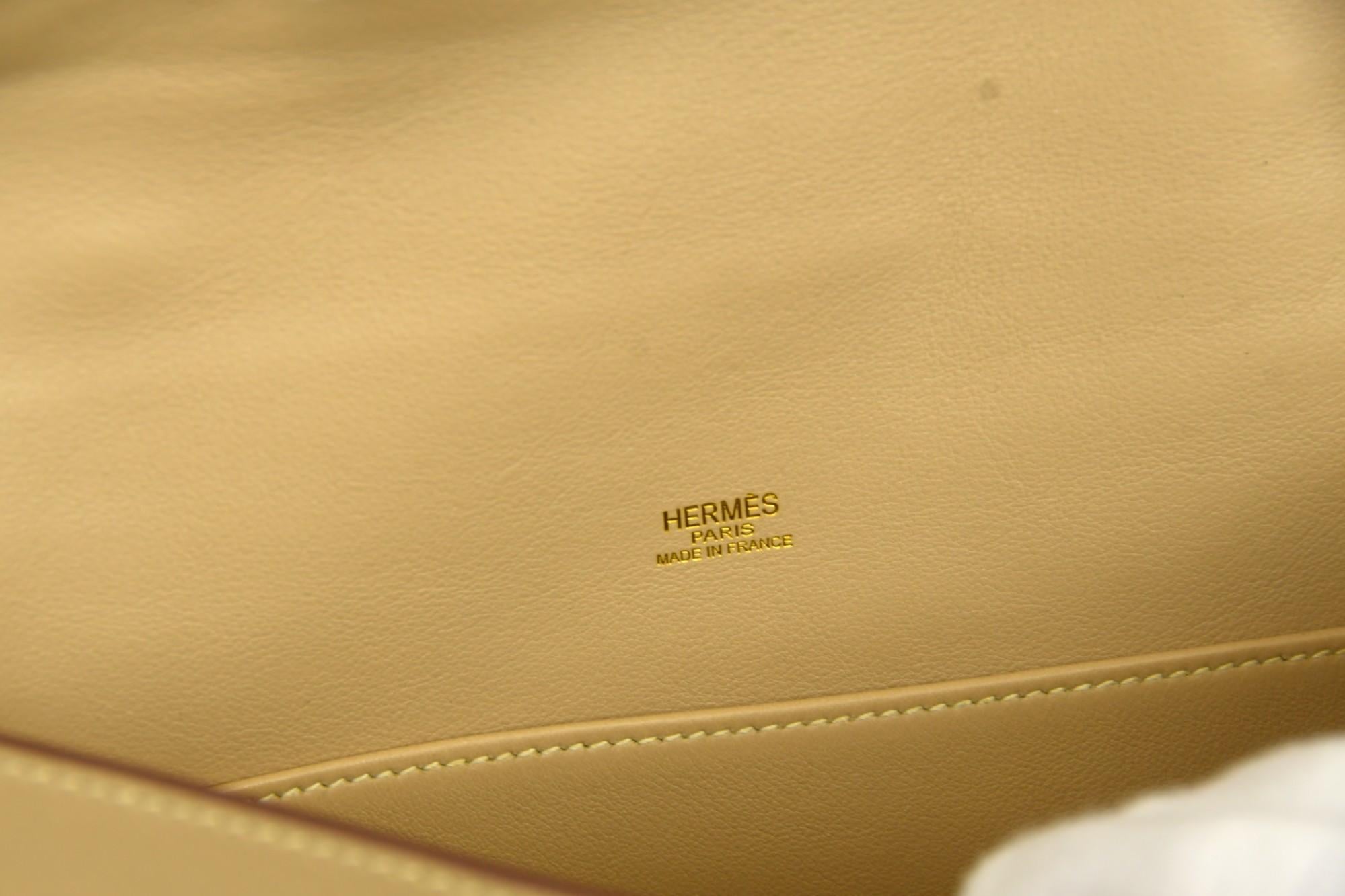 Marrone Hermès Swift Kelly Longue Clutch Pochette Parchemin  HW dorato e serratura classica in vendita