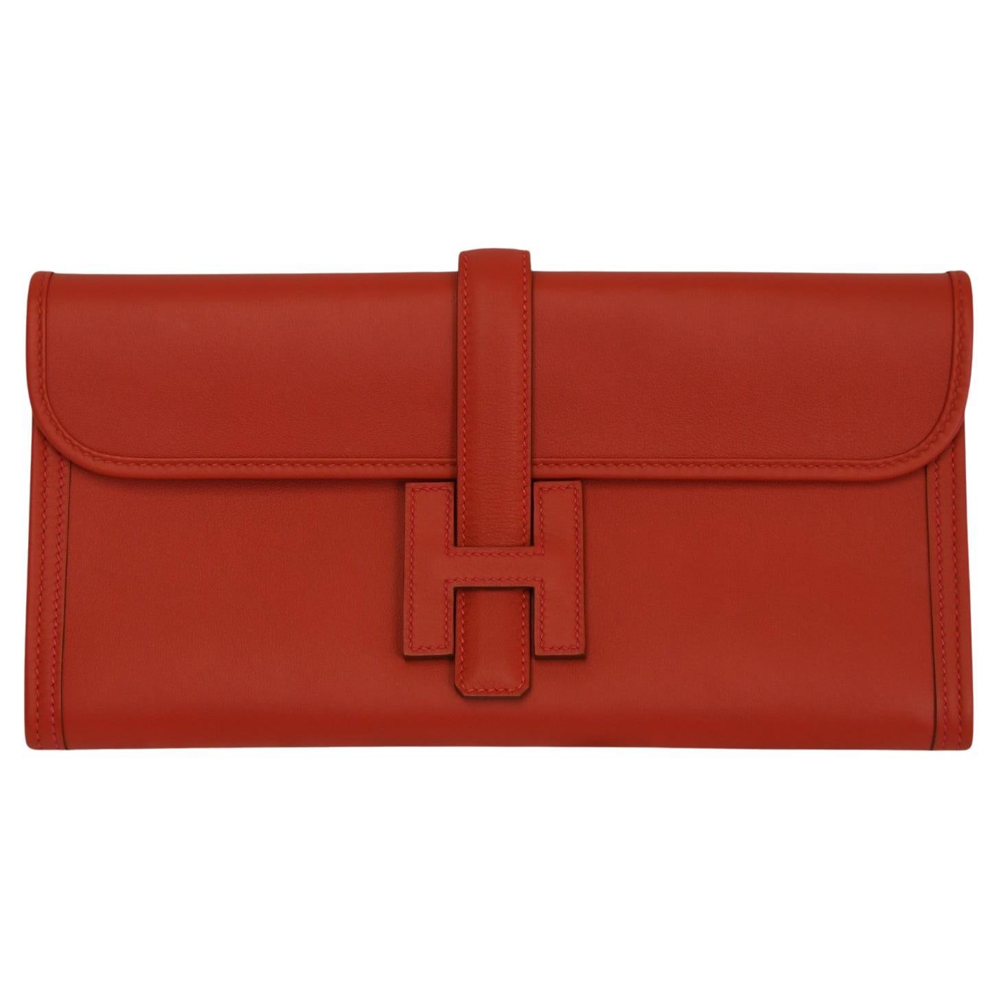 Pochette Hermès Jige Élan 29  Pelle Rouge Casaque con chiusura H. H. in vendita