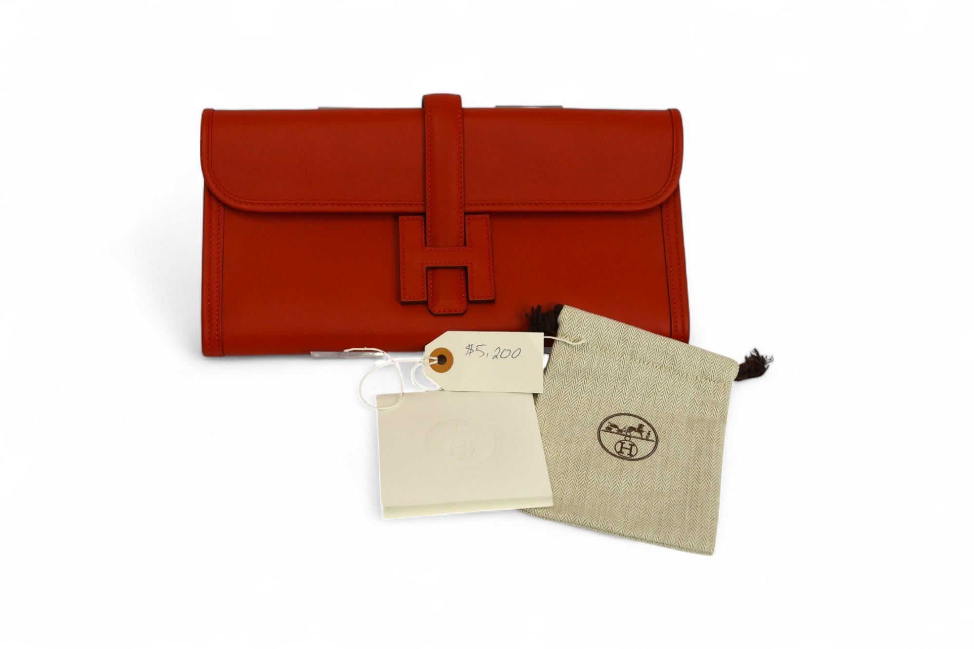 Pochette Hermès Jige Élan 29  Pelle Rouge Casaque con chiusura H. H. in vendita 2