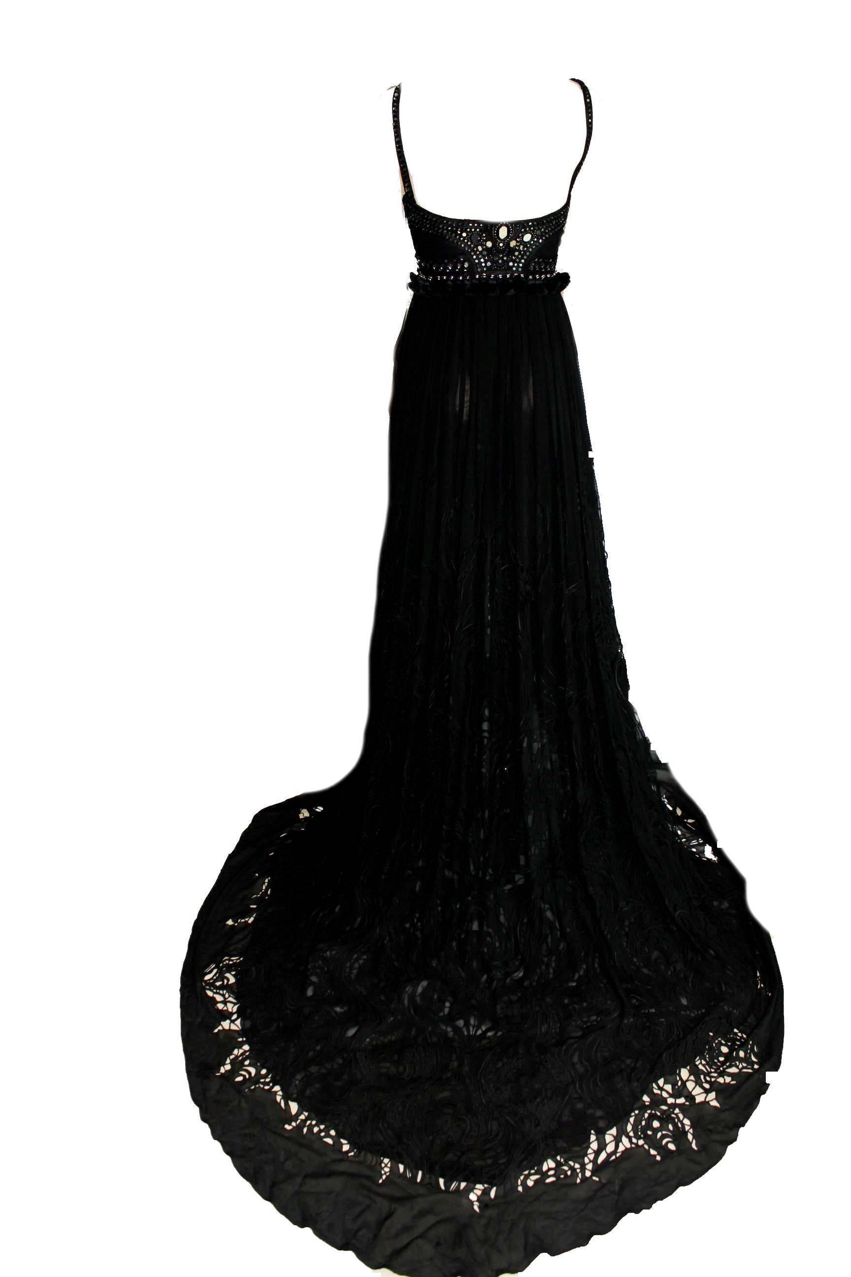 ABSOLUTELY INSANE EMILIO PUCCI BLACK MIRROR TASSLE EVENING GOWN

DESIGNED BY PETER DUNDAS

EXCLUSIVELY FOR KATY PERRY - ONLY ONE!

    Exclusive and gorgeous EMILIO PUCCI evening gown
    Sexy cutout details
    Decorated with mirror details and