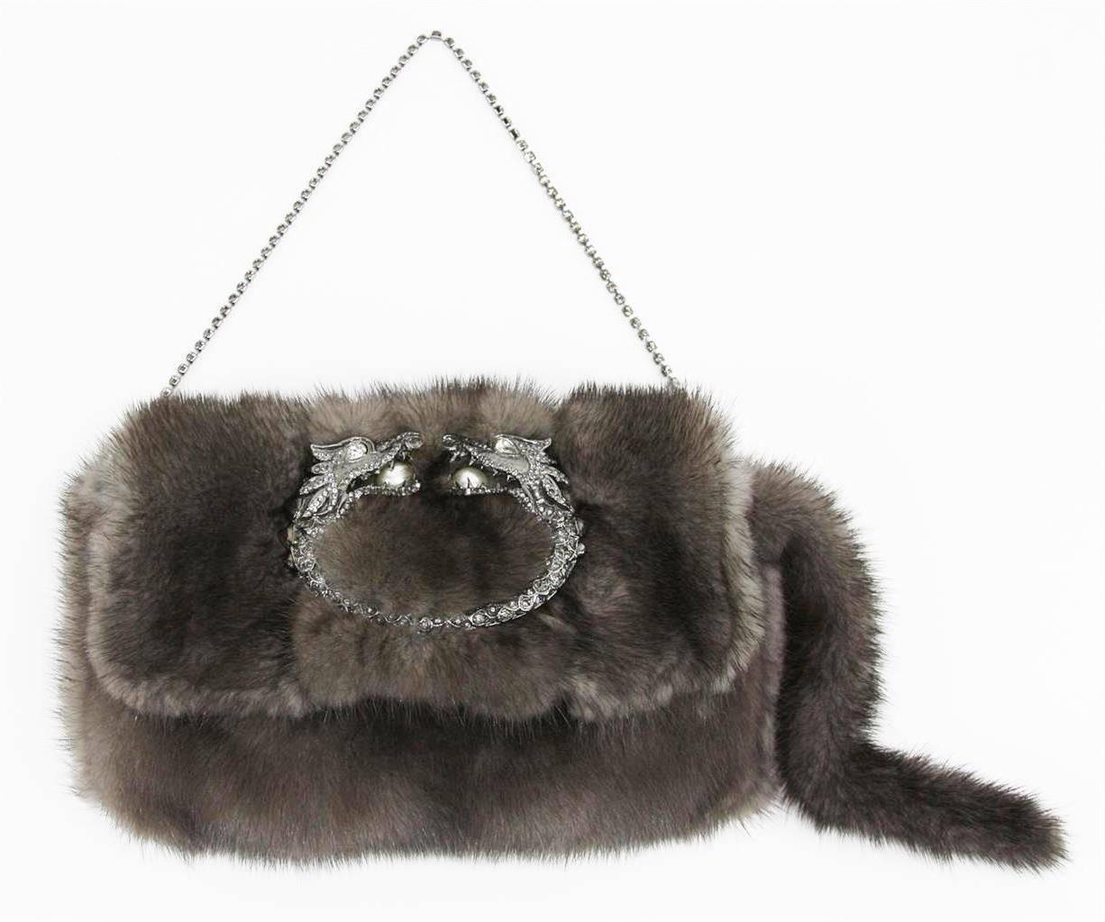 EXTREMELY RARE

GUCCI BY TOM FORD

GORGEOUS MINK FUR EVENING BAG

WITH STUNNING JEWELED DRAGON DETAIL

DETAILS: 
A GUCCI signature piece that will last you for many years
From one of GUCCI's most stunning collections by Tom Ford
Very rare