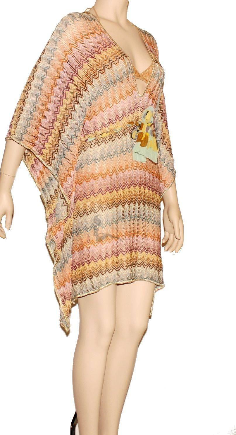 Beautiful pastel shades
Classic MISSONI signature zigzag knit
With gorgeous golden lurex thread
Simply slips on
Fit can be regulated by drawstring on waist
Batwing / Dolman sleeves
Golden Contrast trim
100% Rayon
Dry Clean only
Made in Italy
The