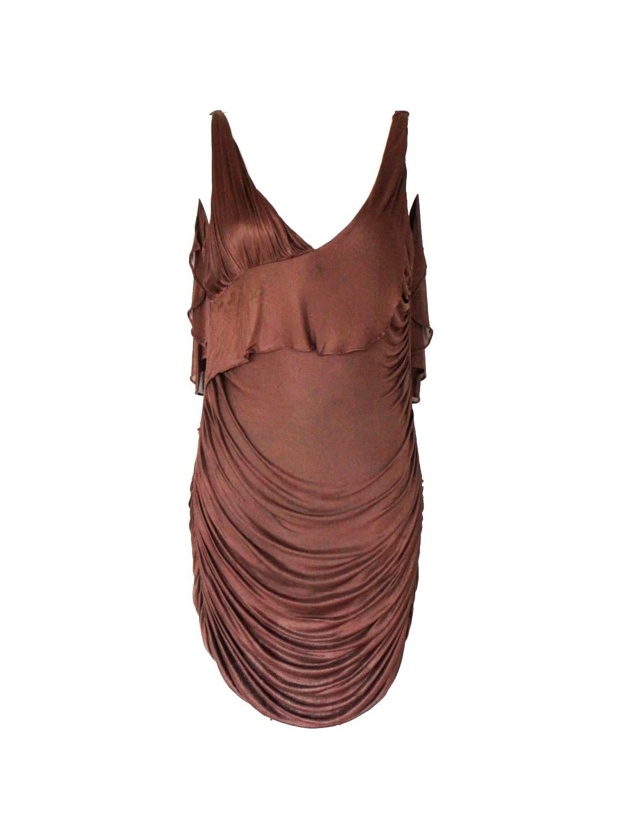 RARE COLLECTOR'S ITEM

STUNNING BROWN DRAPED GODDESS DRESS

BY TOM FORD FOR HIS SS 2003 COLLECTION FOR GUCCI

THIS RARE PIECE IS A SAMPLE FROM THE ATELIER

A SIMILAR DRESS HAS BEEN GIFTED BY TOM FORD TO THE METROPOLITAN MUSEUM IN NEW YORK IN 2003