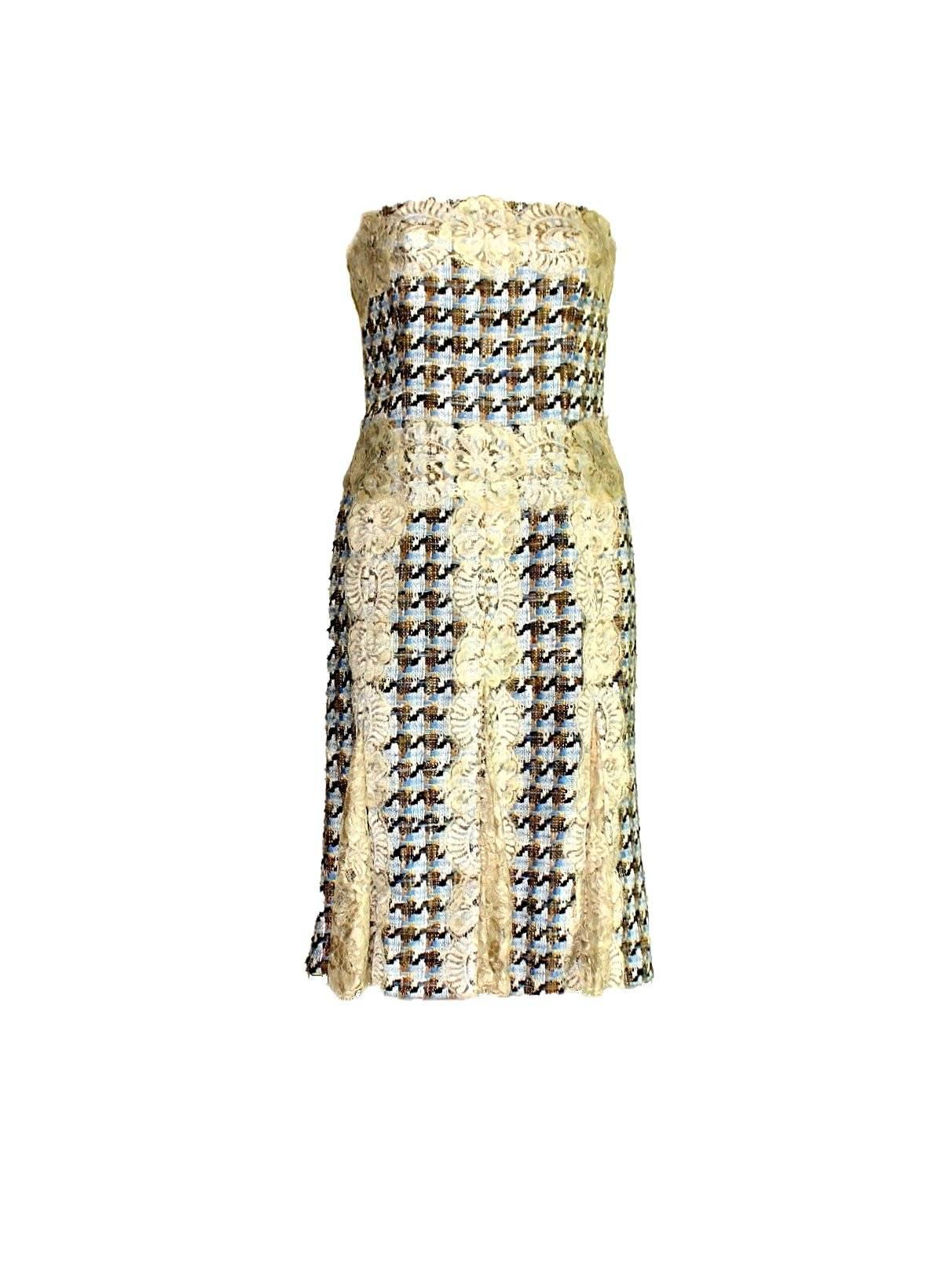     A DOLCE & GABBANA classic signature piece that will last you for years
    Consisting of a dress with matching jacket
    Both pieces made of amazing tweed fabric with cream lace trip
    Scalloped edges
    The dress has a beautifully