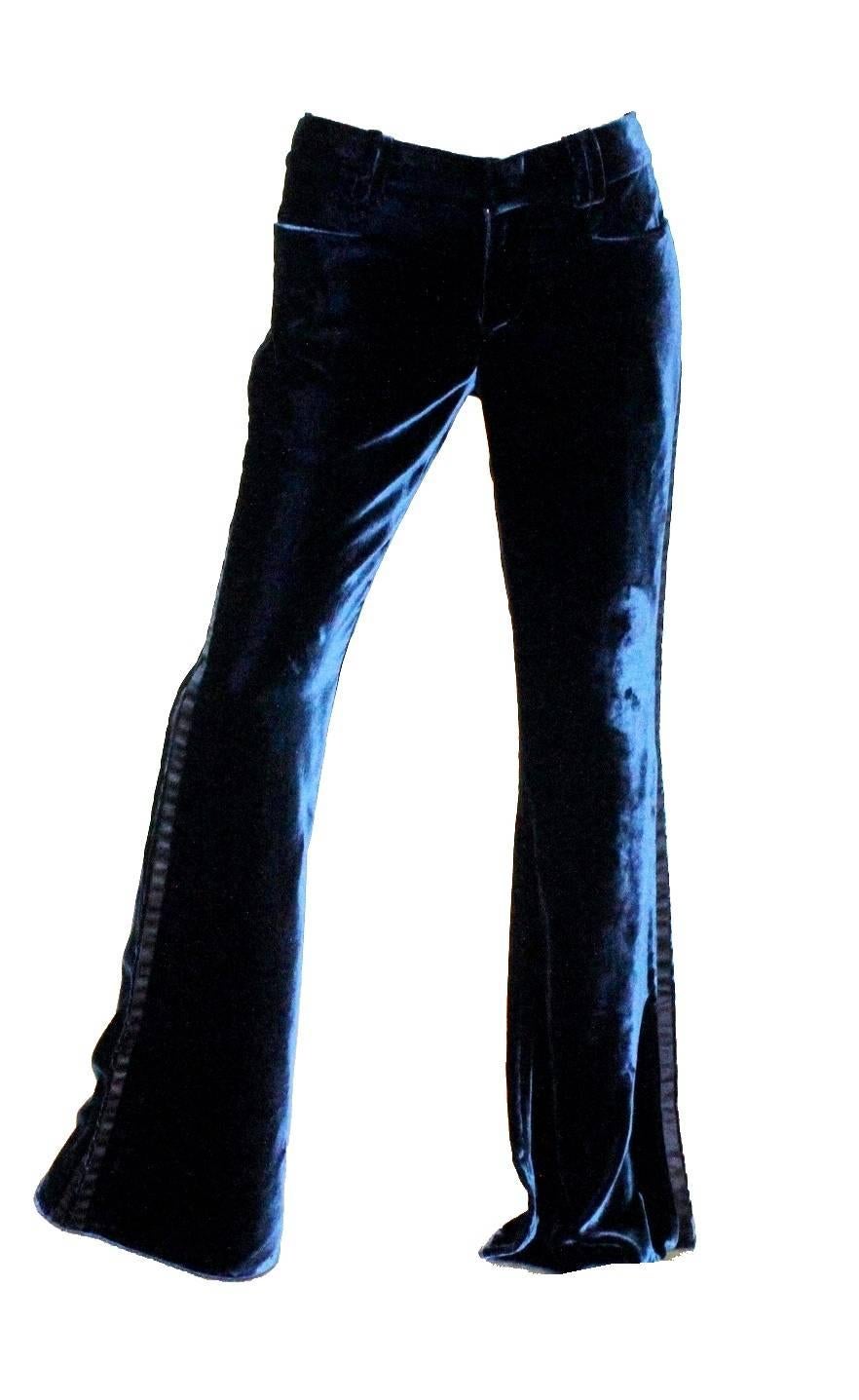 Stunning midnight blue Gucci velvet tuxedo pants
Created by Tom Ford for his final collection for Gucci in 2004
Finest plush velvet fabric
Silk stripes on sides
Unhemmed, original open hem
Made in Italy
Dry Clean Only

