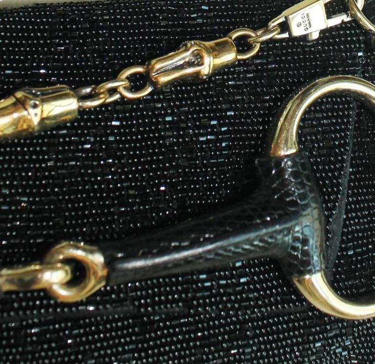 A Gucci signature piece in the famous GG Monogram
Limited Edition only sold in selected Gucci flagship stores
Beautiful beaded jet black bag with lizard skin trimmings
Famous Gucci signature horsebit design
Gold-colored hardware
Detachable