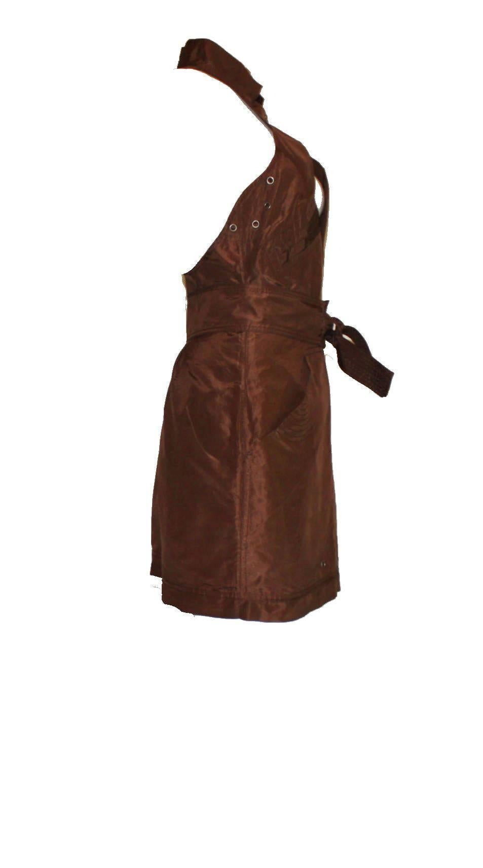 Stunning Chocolate Brown Taffeta Dress
By Tom Ford for Gucci Spring 2003
The same dress was shown on the runway
Shiny charging brown taffeta silk 
Beautiful dress with racer back
Deep plunge 
Attached belt 
Zip and small studs discreetly