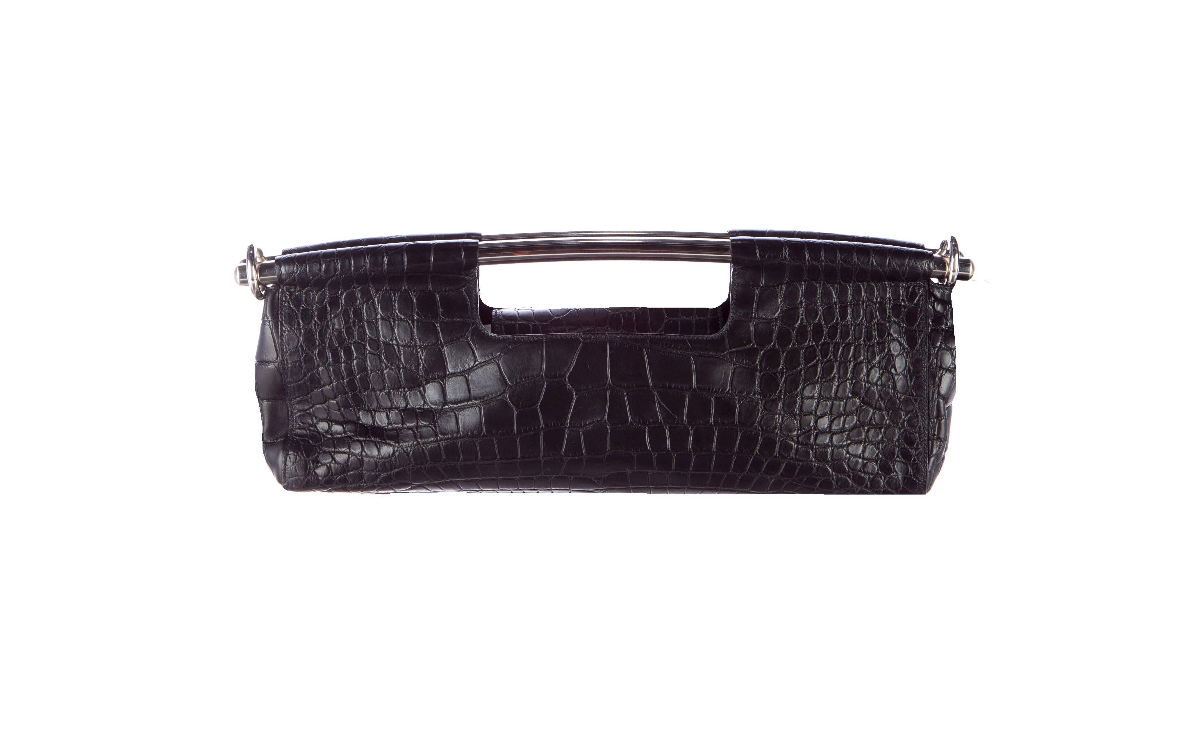 A stunning Prada Alligator Skin Handbag
Finest mat black soft exotic skin - no print
In excellent condition
Some fine scratches on hardware
The leather is flawless and shows no scratches, abrasions or other defects
Fully lined
One zipped inner