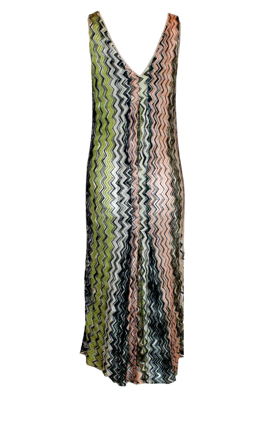Beautiful Missoni Crochet Knit Dress
Missoni Signature piece in the famous zigzag design
Pleated details in front and back
Box pleat skirt
Deep V-Neck
Beige trimming
Unlined
Made in Italy
Dry Clean Only
