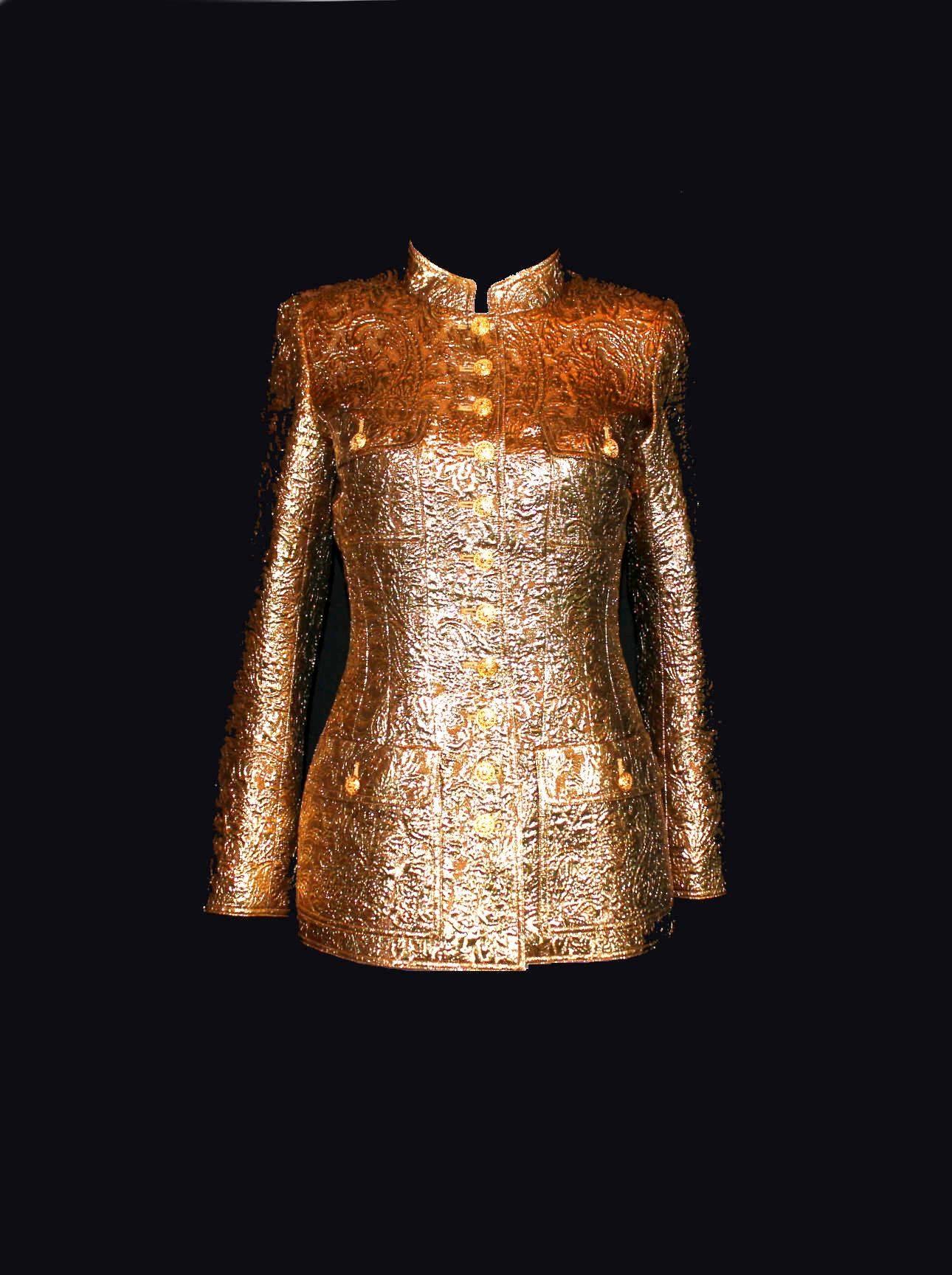 A true icon designed by Karl Lagerfeld for Chanel
Golden metallic jacket
3D structure
Golden buttons in front and on sleeves with CC logo
Fully lined with beige CC logo silk
Seen in the Chanel exhibition in the Metropolitan Museum NYC
Part of the AD