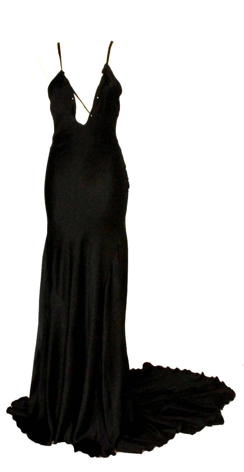 
Rare Collector's item

Beautiful black evening silk lace-up evening gown

by Tom Ford for Gucci FW 2002
This Gucci signature piece was sold out immediately
It was featured in the gucci runway show and many magazines


Details:

   Beautiful black