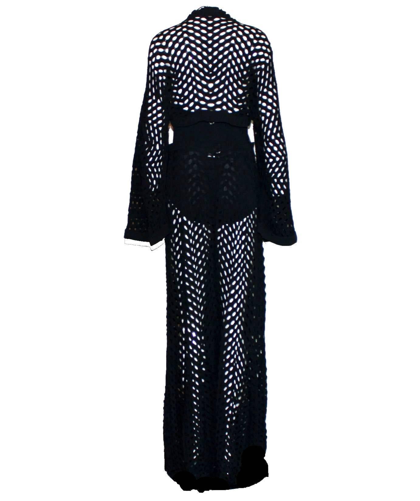 An absolutely stunning and timeless Chanel ensemble
Consisting of three pieces: Swimsuit/Bodysuit, pants and jacket
Softest black crochet knit
Beautiful shaped wide-leg pants
Cardigan with amazing batwing sleeves
Matching swimsuit with neckholder,