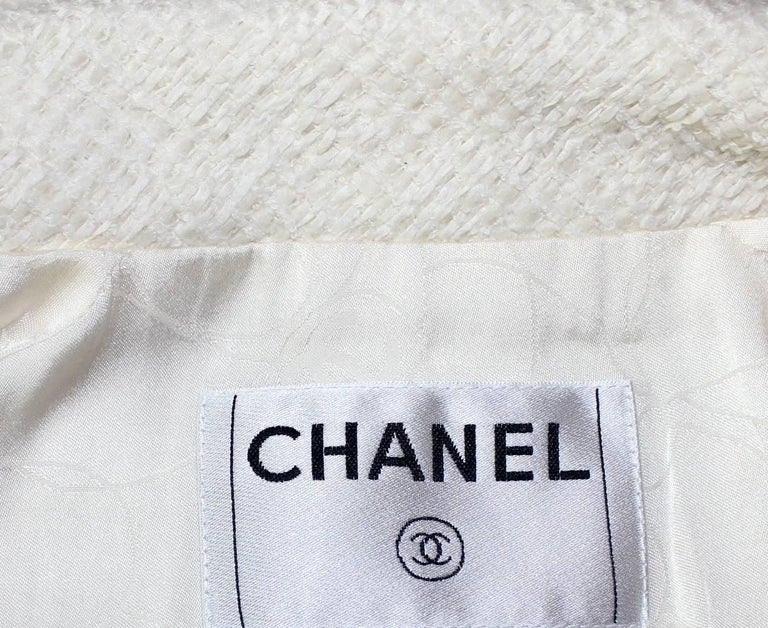 Classy Chanel Ivory Tweed CC Logo Button Jacket at 1stDibs