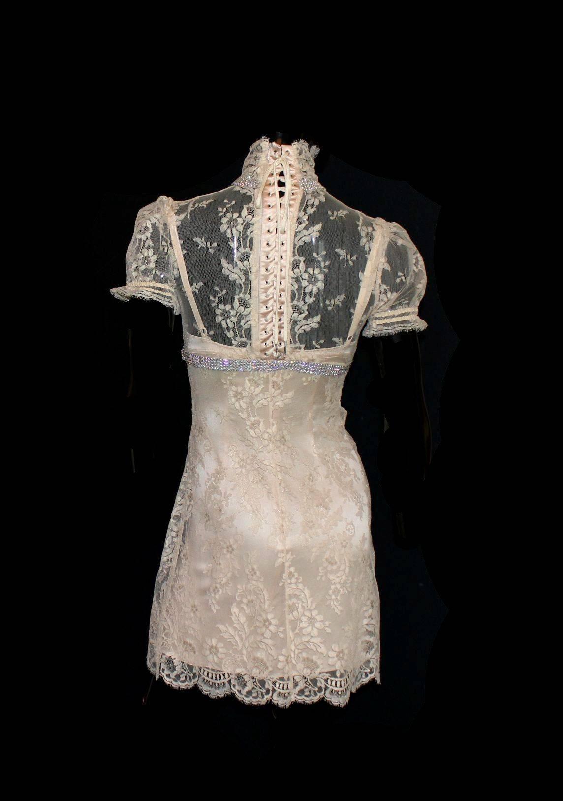 INCREDIBLE!!!

EXTREMELY RARE

DOLCE & GABBANA LACE, CRYSTALS AND LACE UP DRESS


A DOLCE & GABBANA timeless classic signature piece that will last you for years
Made out of fine French lace
Embellished with sparkling crystals
Empire taille
Lace up
