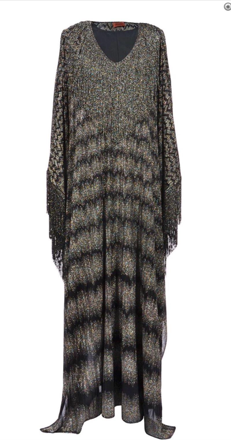 
Missoni's maxi dress is cut in a bohemian-inspired kaftan silhouette enhanced by swathes of swishy fringing. It's spun from kaleidoscopic metallic yarns in the label's iconic zigzag crochet-knit. The deep side splits emphasize the relaxed