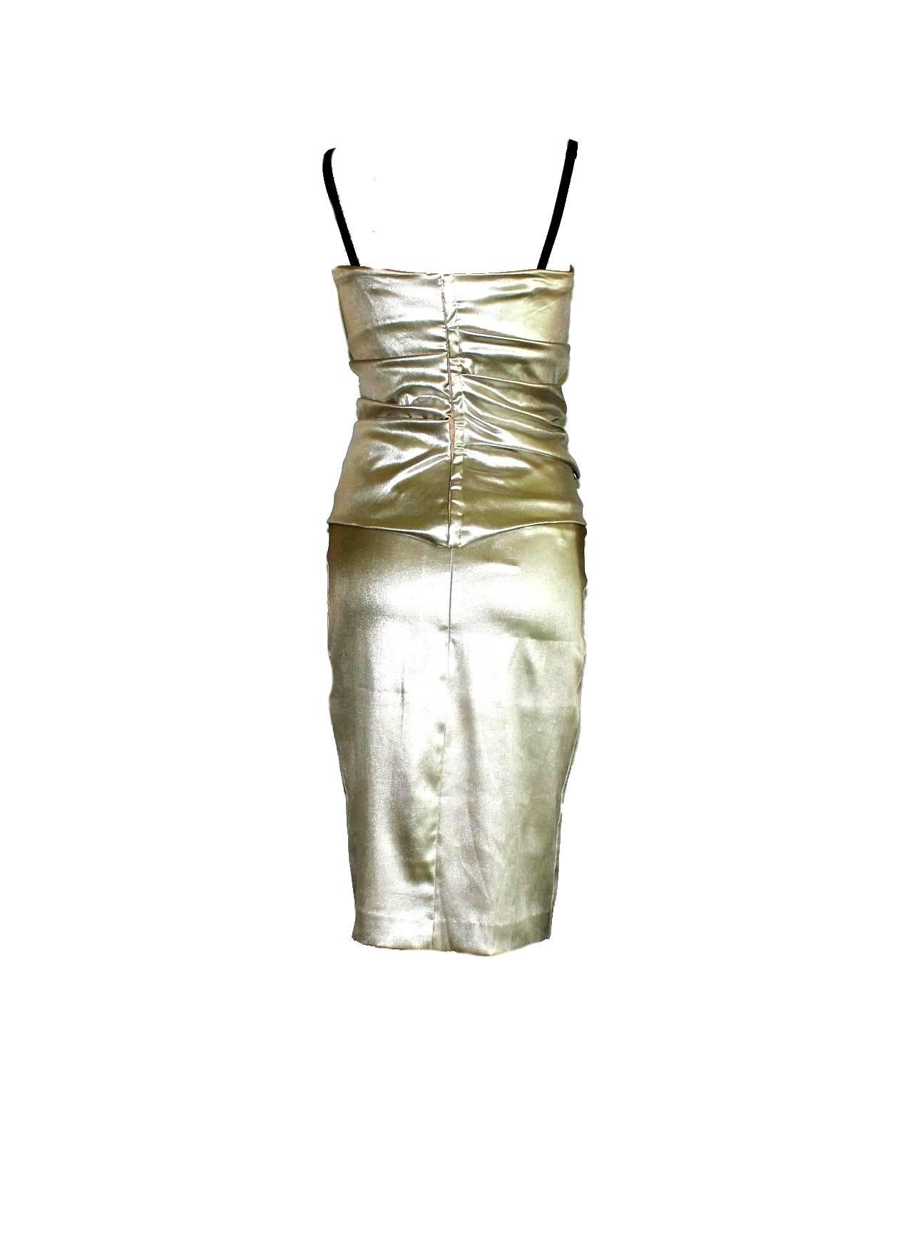 BREATHTAKING METALLIC SILVER ENSEMBLE LIKE DRESS 

COLLECTOR'S PIECE

    A DOLCE & GABBANA classic signature piece that will last you for years
    From the famous 1998 collection
    One of the key pieces of the collection
    Shown on the
