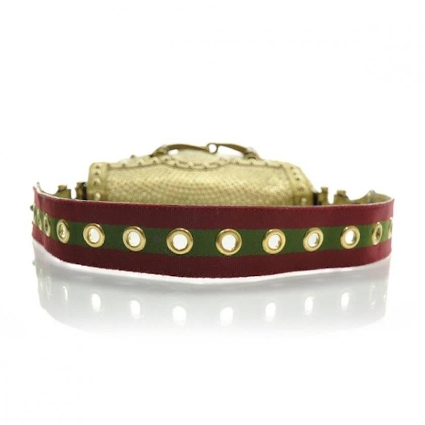 BEAUTIFUL

 GUCCI 

GOLDEN STUDDED FLAP BAG

ONE OF THE MOST FAMOUS SIGNATURE PIECES BY GUCCI OF THAT SEASON

SHOWN ON THE RUNWAY SHOW AND IN THE AD CAMPAIGN

DETAILS: 

A GUCCI signature piece that will last you for many years
From one