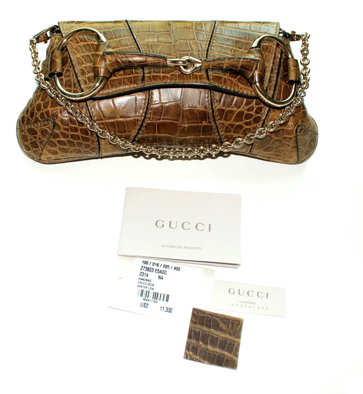 Fantastic Gucci Flap Bag from the famous 1921 collection
A timeless Gucci piece with the signature horsebit detail
Luxurious exotic crocodile skin - no print!
Limited Edition
Fully lined with leather
One inner pocket
Shiny light golden