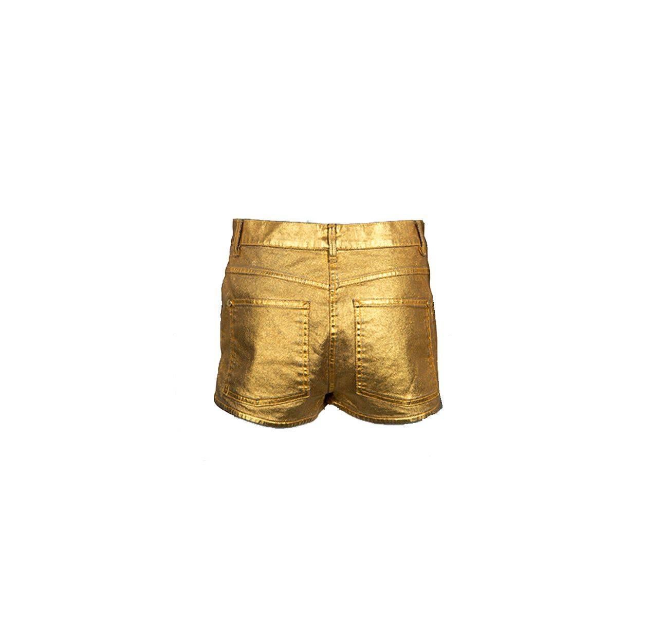 A pair of stunning golden Chanel hot pants
Denim fabric painted in gold
Made in France
Dry Clean Only
Recent Collection