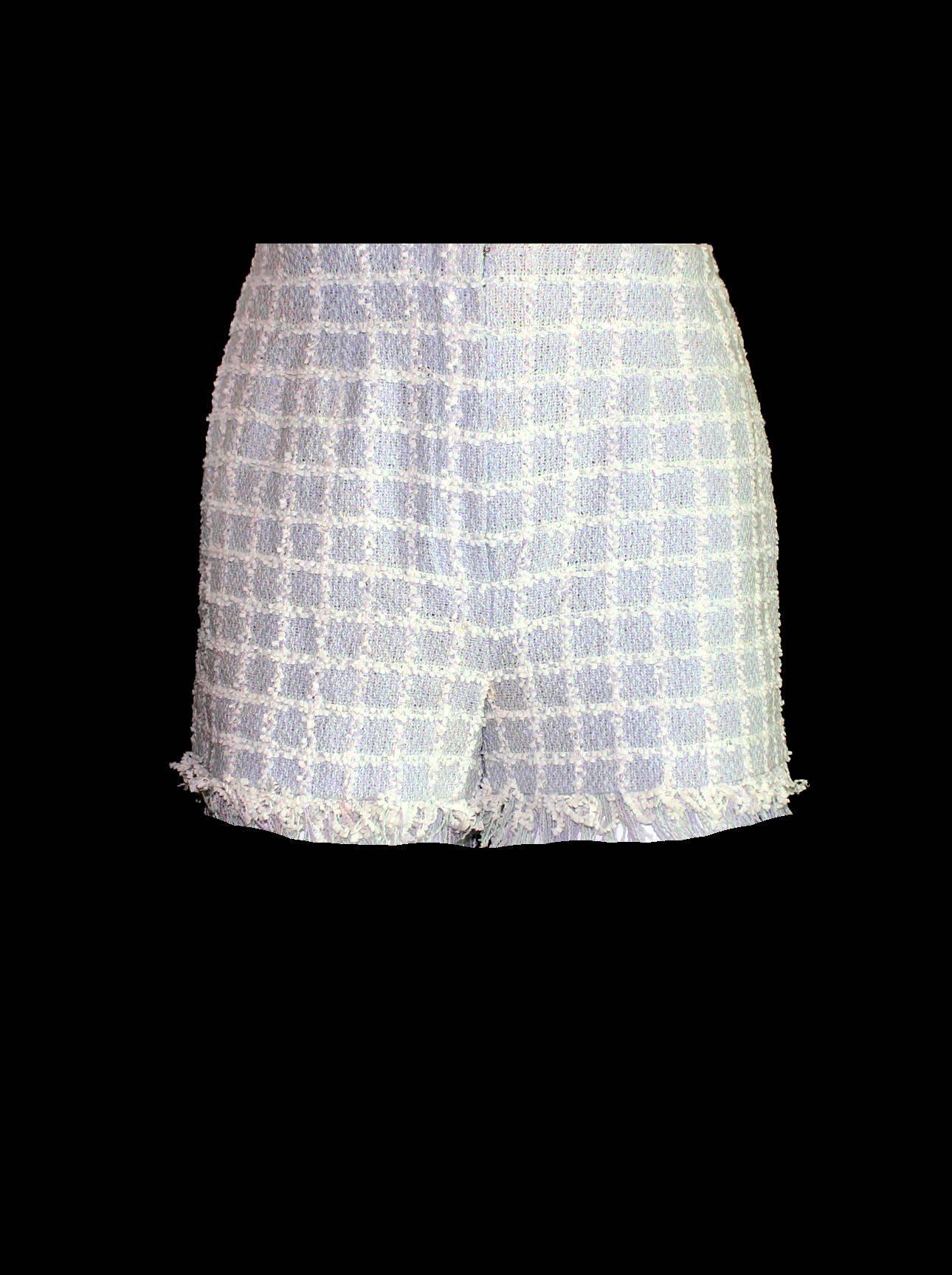 Beautiful Chanel tweed shorts
Designed by Karl Lagerfeld for his iconic 1994 Chanel collection
Fringed details
Amazing pastel colors
Lined with CC logo silk
Closes with zip in front
Made in France
Dry Clean Only