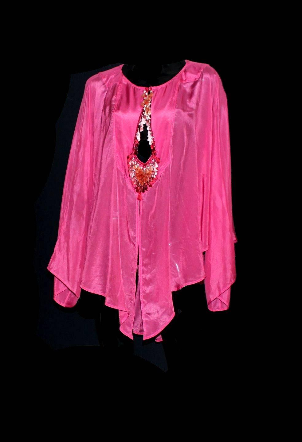 Stunning piece by Gucci
From 2004 collection
Desiged for Gucci 
Beautiful shimmering silk - colors reflecting with light
Pink color - SO Barbie!
Batwing sleeves
Gorgeous ombre tassels with macrame knitting
Peekaboo cutout details
Cleavage can be