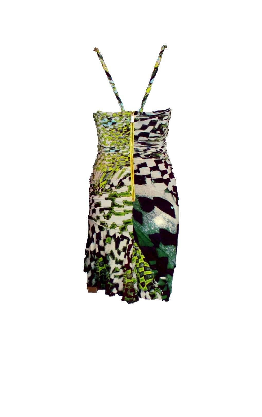 Head-turning corset dress by Roberto Cavalli
In the famous animal fantasy print
With Roberto Cavalli signature all over
Corset bodice inside for a perfect and firm fit
Ruched details 
Closes with decorative zipper in back
Made in Italy
Dry Clean