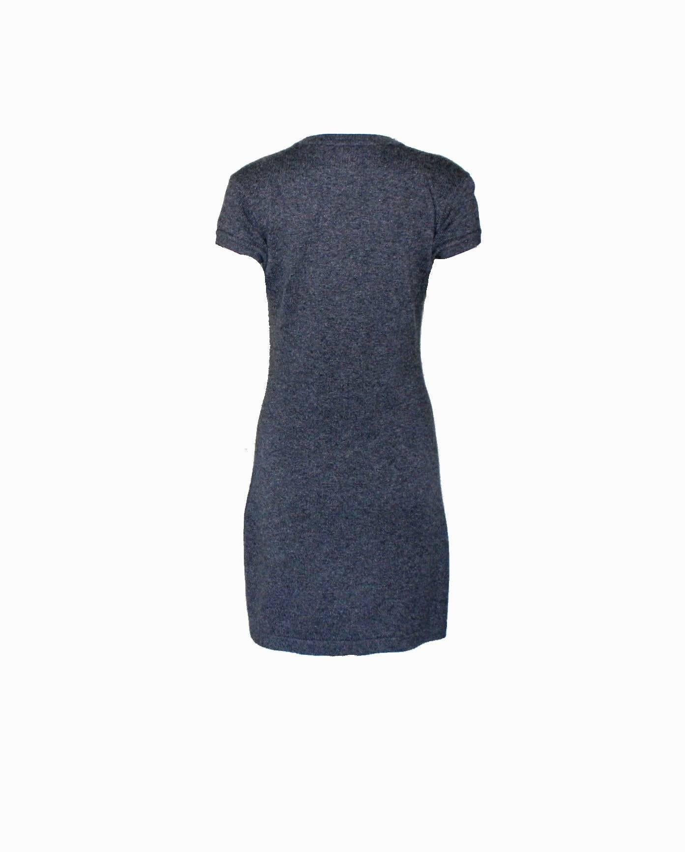 Bodyhugging signature cashmere dress by Chanel
A timeless classic
Simply slips on
Two front pockets
Charcoal grey color
Finest cashmere knit
COCO CHANEL PARIS Patch embroidered with pearls and camellia
Fashion Jewelry not included
Dry Clean