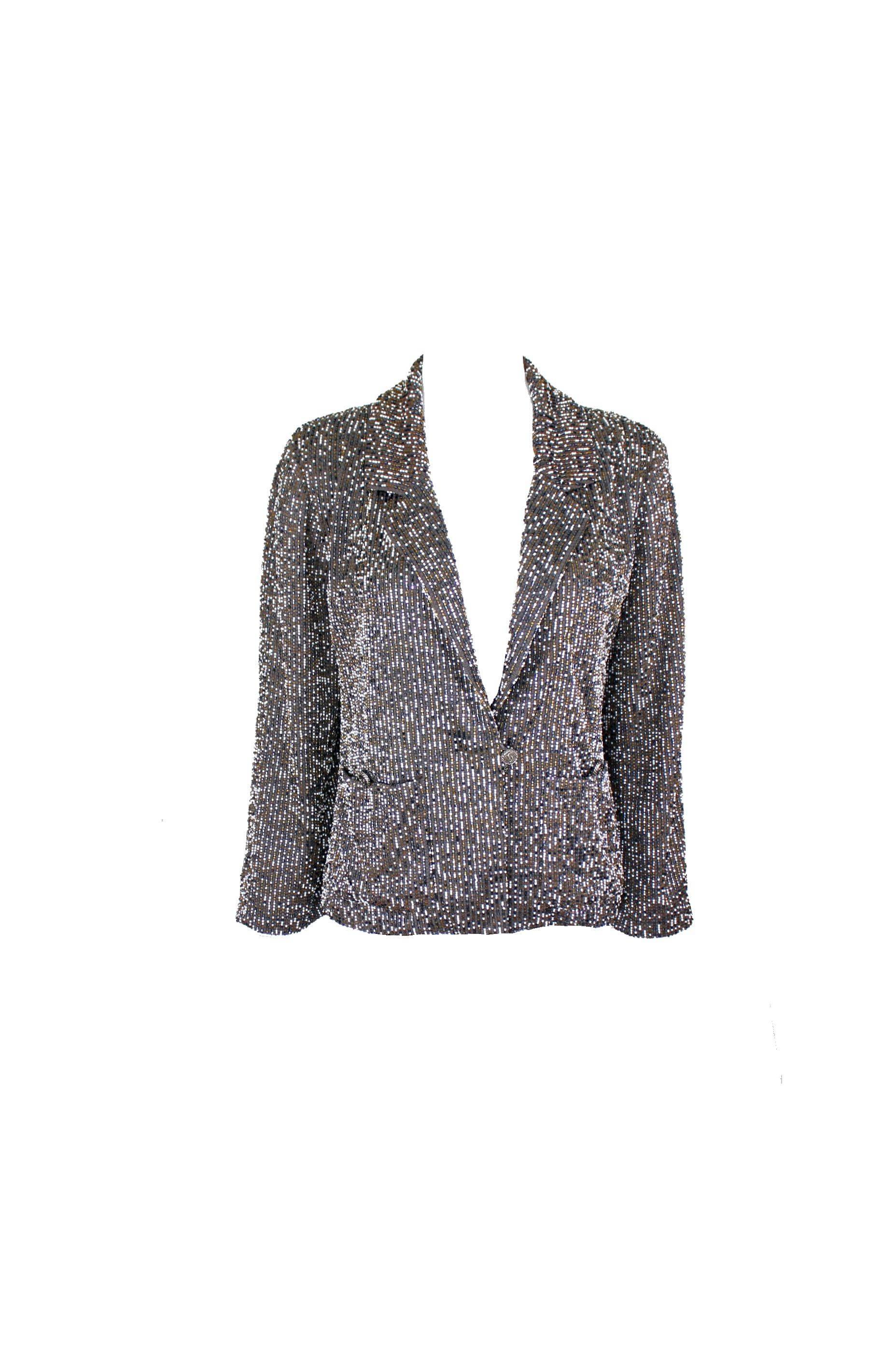 Beautiful CHANEL jacket designed by Karl Lagerfeld
A true CHANEL signature item that will last you for many years
Stunning piece
Hand-embroidered in Chanel's Atelier with many small pearl bead - just like Haute Couture
Fully lined with finest CC