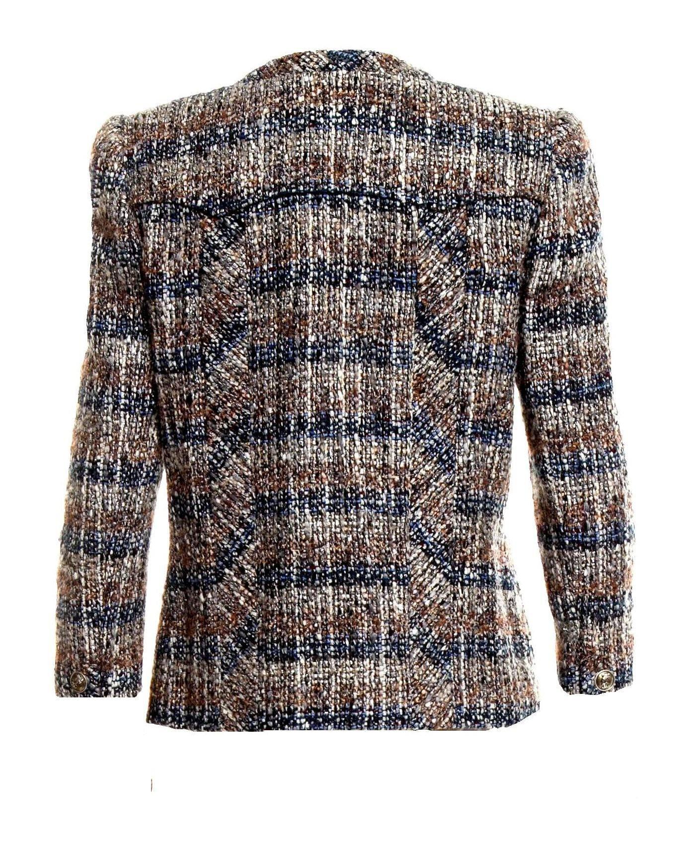 Beautiful CHANEL fantasy tweed jacket
A true CHANEL signature item that will last you for many years
Stunning colors, so versatile, perfect with jeans!
Closes in front with zip closure
Amazing metallic tweed fabric
Beautiful CC Chanel logo buttons