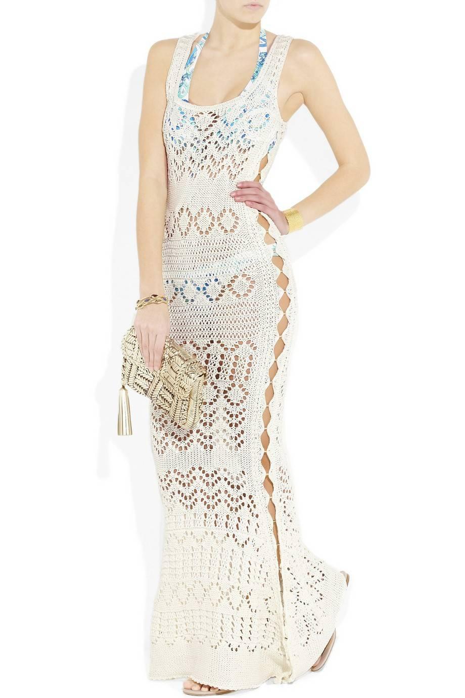 Absolutely Insane Emilio Pucci White Crochet Knit Cutout Gown  
Designed By Peter Dundas  
SS 2011 collection
Sold Out Immediately   

Details:
Exclusive and gorgeous EMILIO PUCCI crochet knit gown
Sexy cutout details
Sleeveless
Off-white