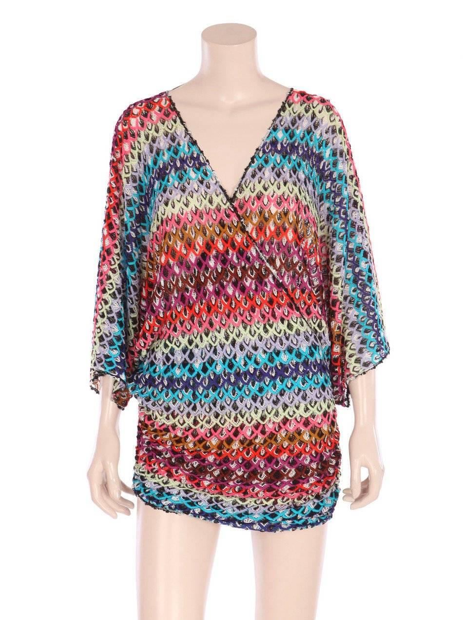 A Missoni signature piece in stunning colors
Multicolored crochet-knit
Deep V-neck
Wrap style
Batwing sleeves
Simply slips on
Made in Italy 
Dry Clean Only
