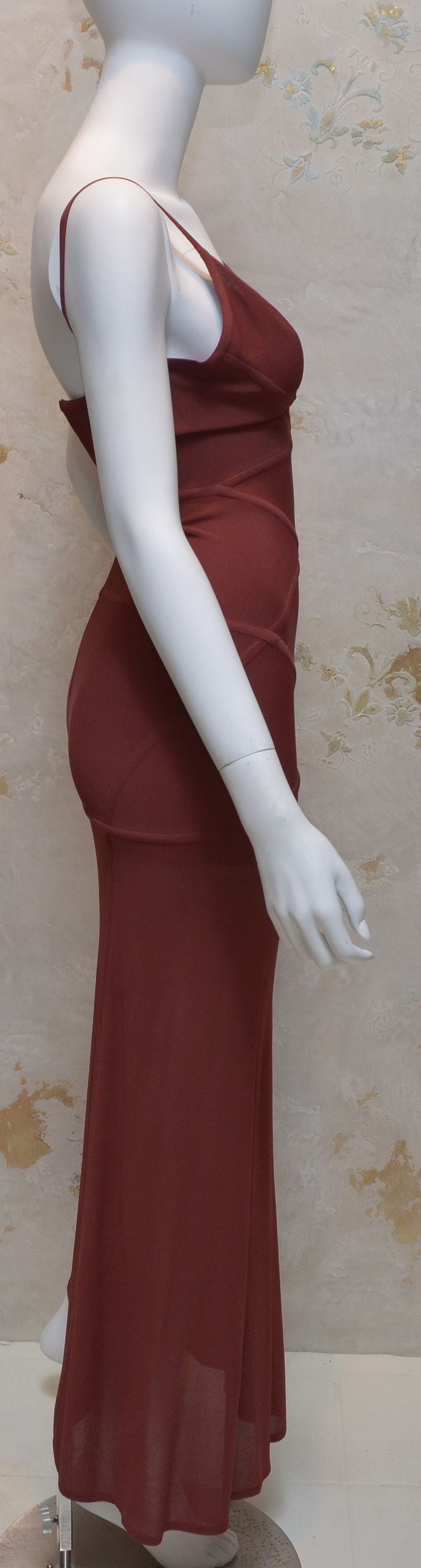 The original - pre BCBG Max Azria, Herve Leger bondage dress is made with 95% rayon and 5% lycra, and has a back zipper closure. Size S. Made in France.

Measurements: Will fit slightly larger due to stretch. Estimated size 0-2
Bust - 32''
Waist -